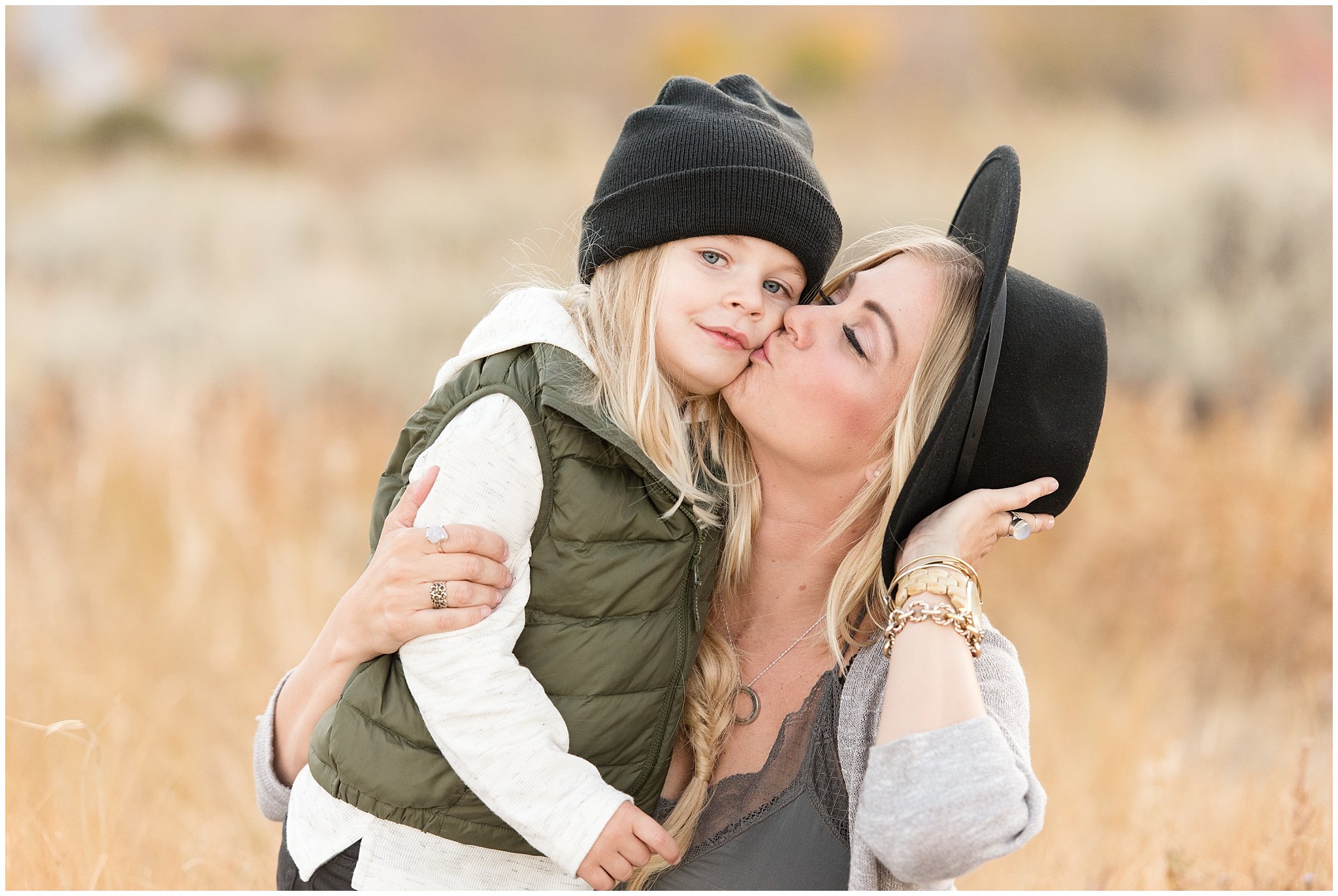 Mom kisses son's cheek during fall family pictures | Fall Family Pictures in the Mountains | Snowbasin, Utah | Jessie and Dallin