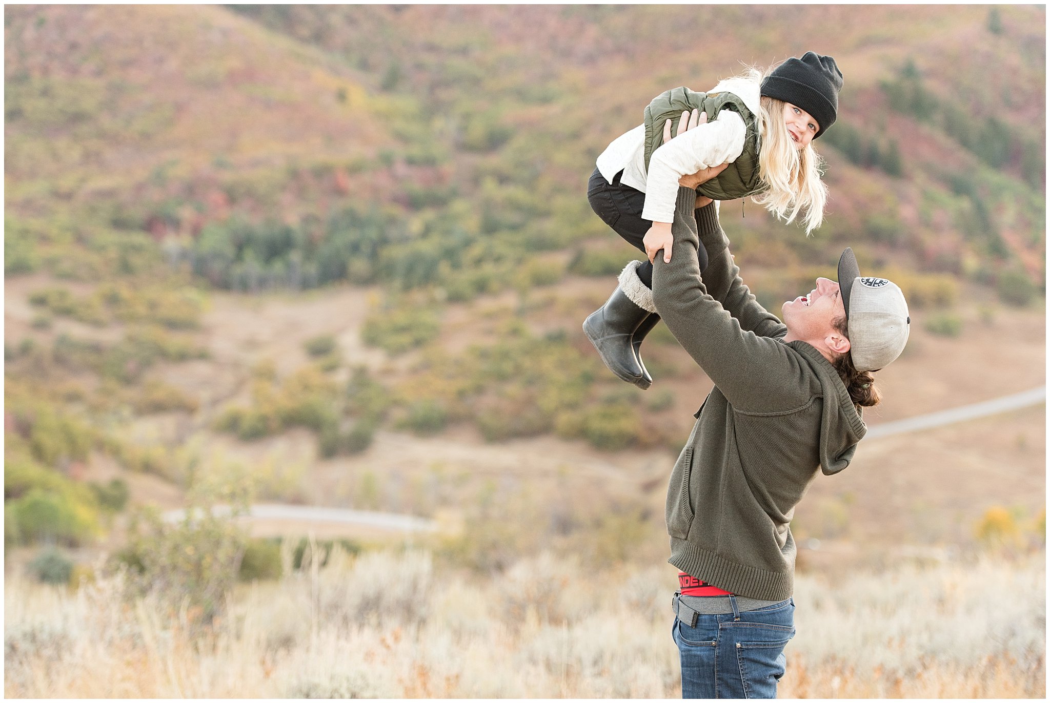 Dad lifts son in the air | Fall Family Pictures in the Mountains | Snowbasin, Utah | Jessie and Dallin