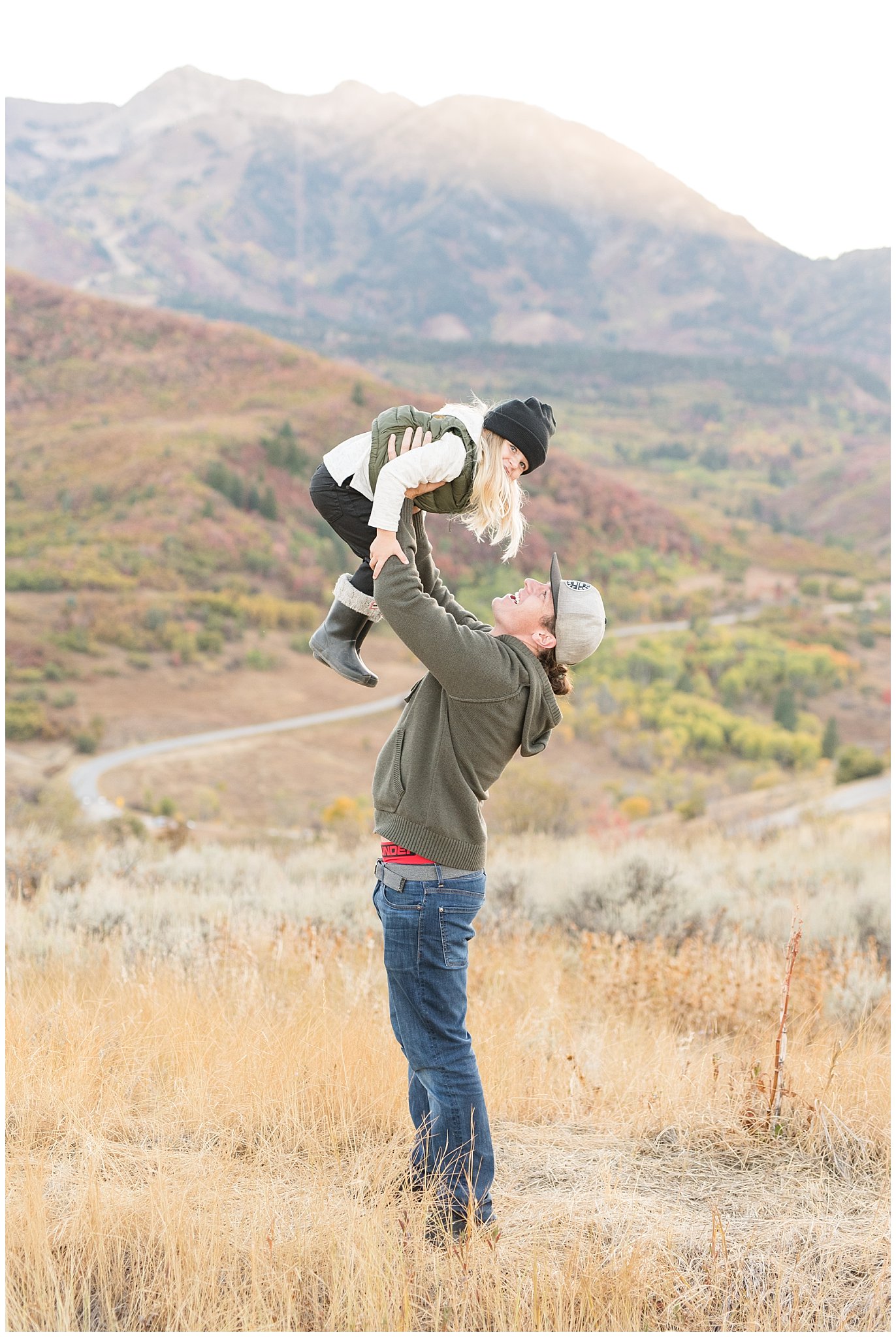 Dad lifts son in the air in the mountains | Fall Family Pictures in the Mountains | Snowbasin, Utah | Jessie and Dallin