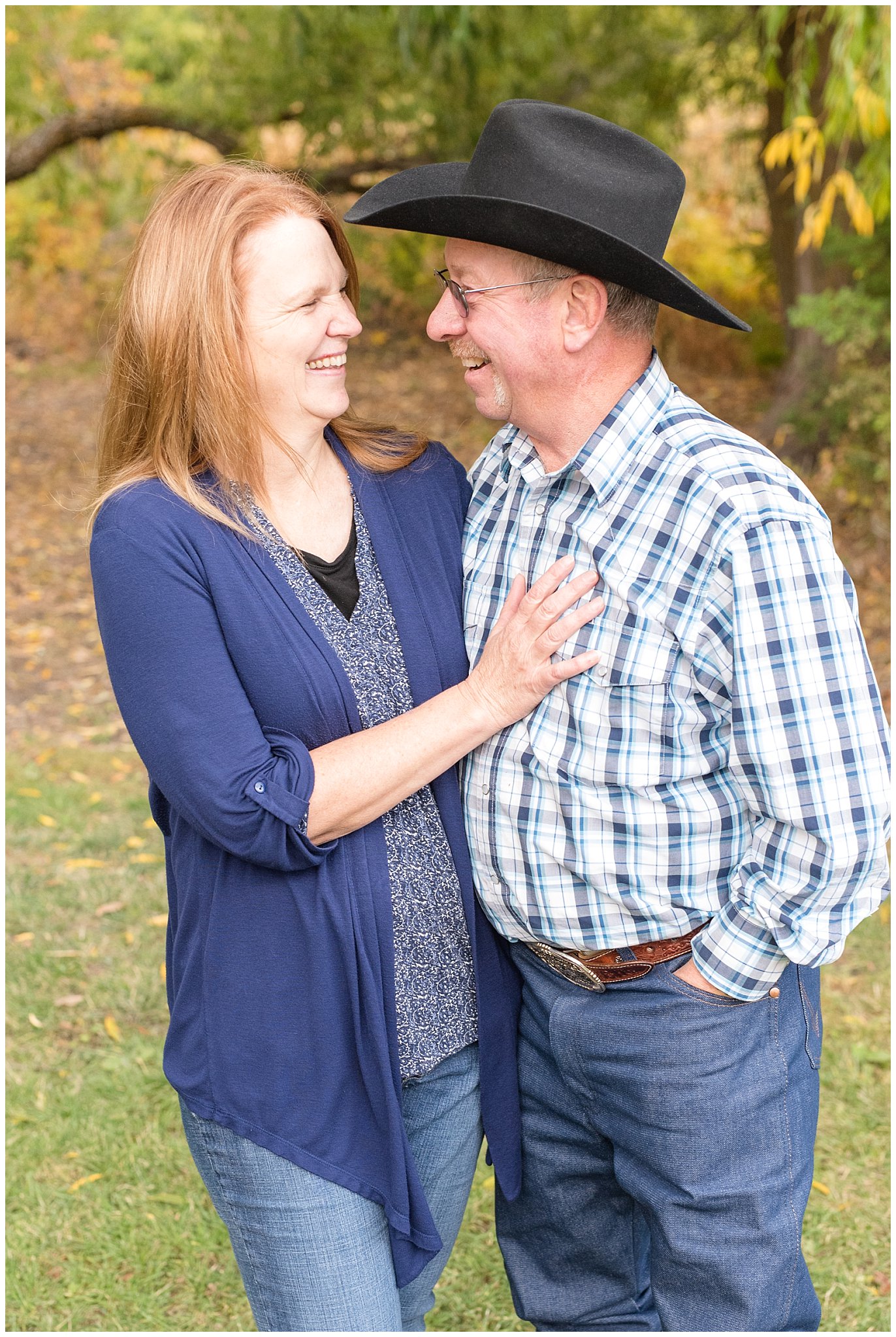 Grandparents looking at each other and laughing candid | Tremonton Family Pictures and Make a Wish Event | Jessie and Dallin Photography