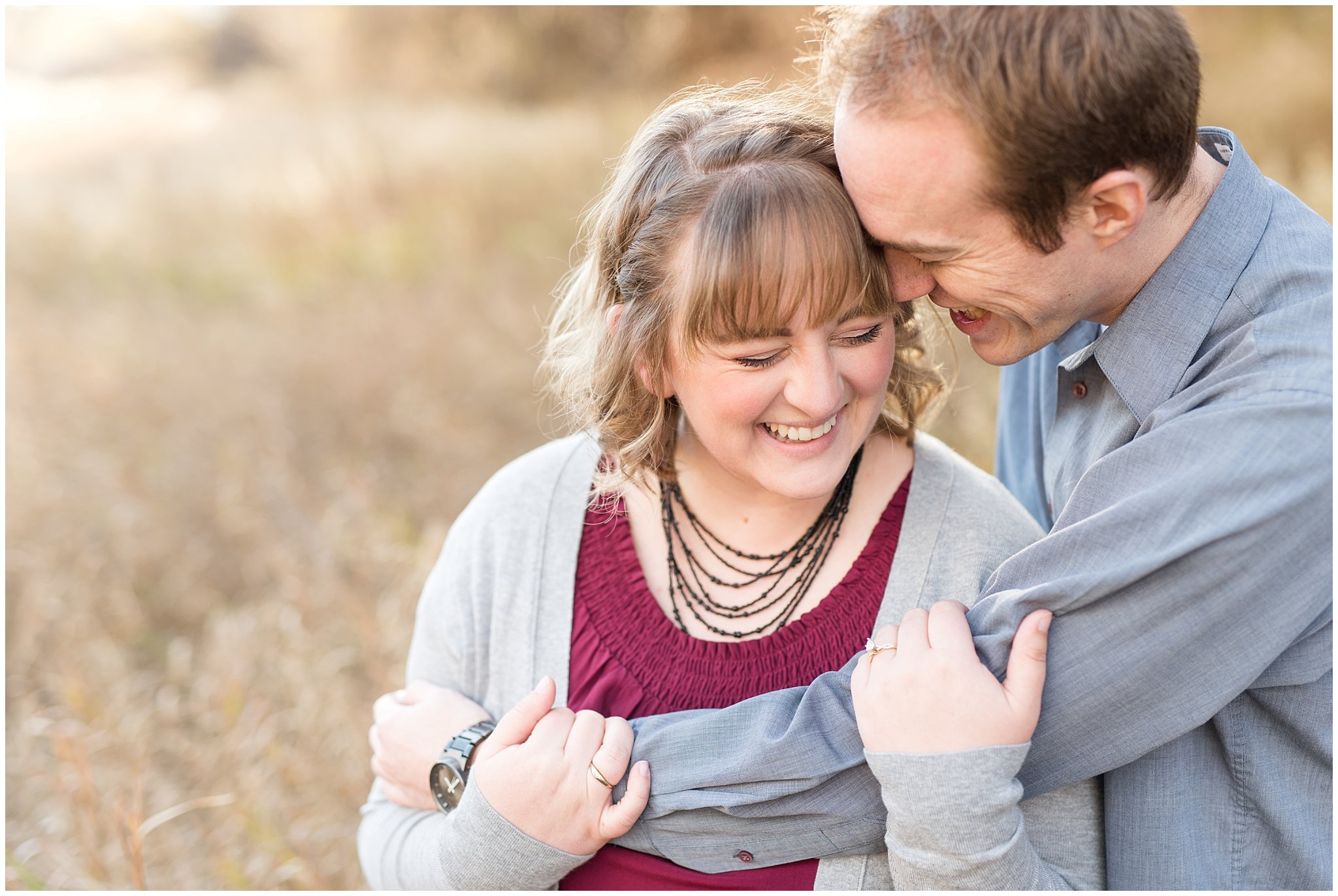 Couple nuzzling close in a field | Davis County Fall Engagement | Utah Wedding Photographers | Jessie and Dallin