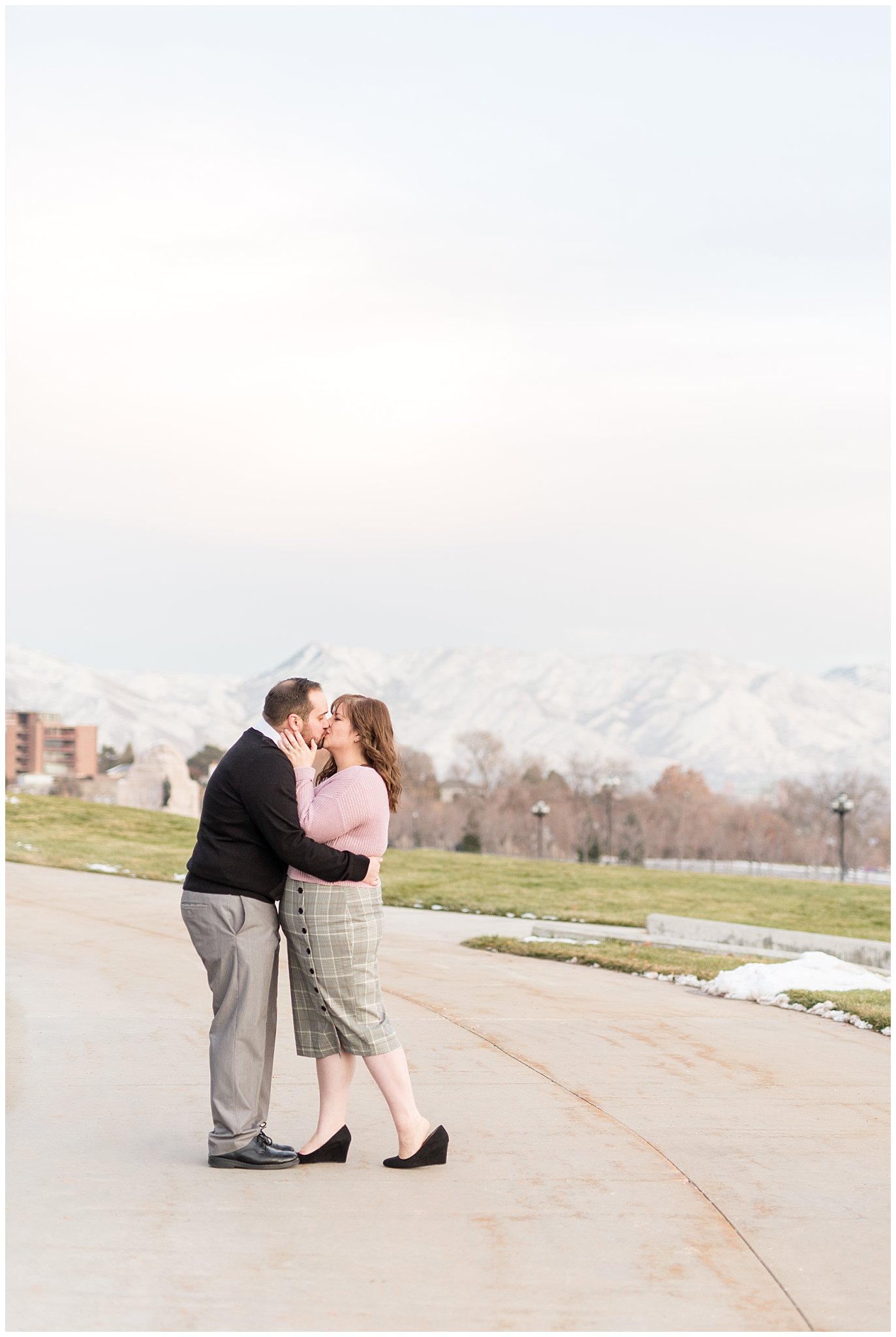 Couple kissing on a path at the Utah State Capitol | Winter Engagement at Mueller Park and the Utah State Capitol | Jessie and Dallin Photography