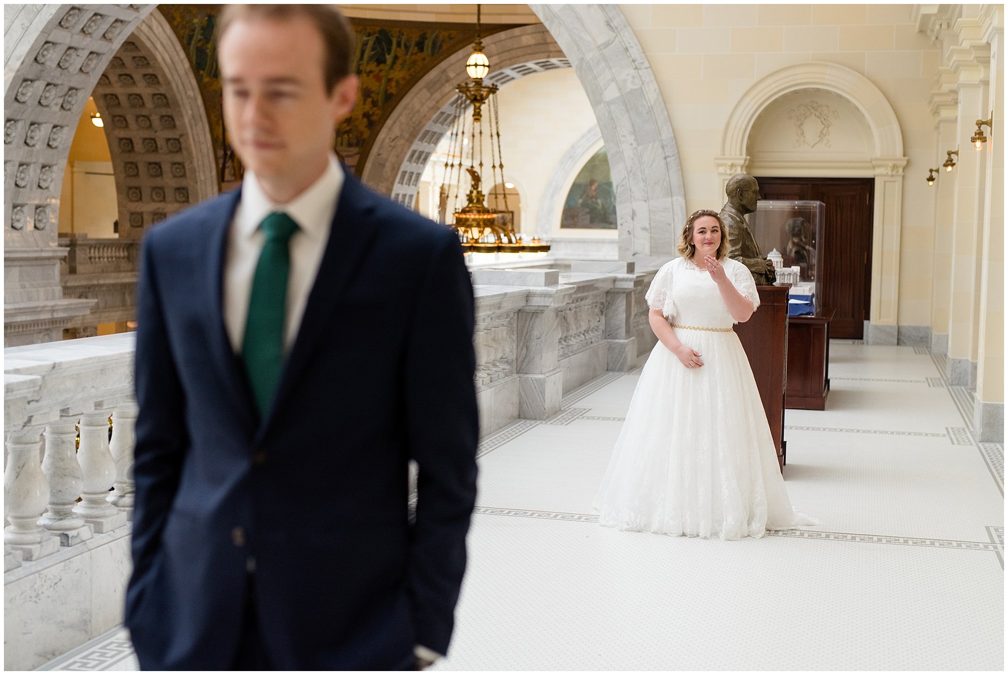 Bride with tears in her eyes before first look inside capitol building | Winter Formals at the Utah State Capitol | Utah Wedding Photography