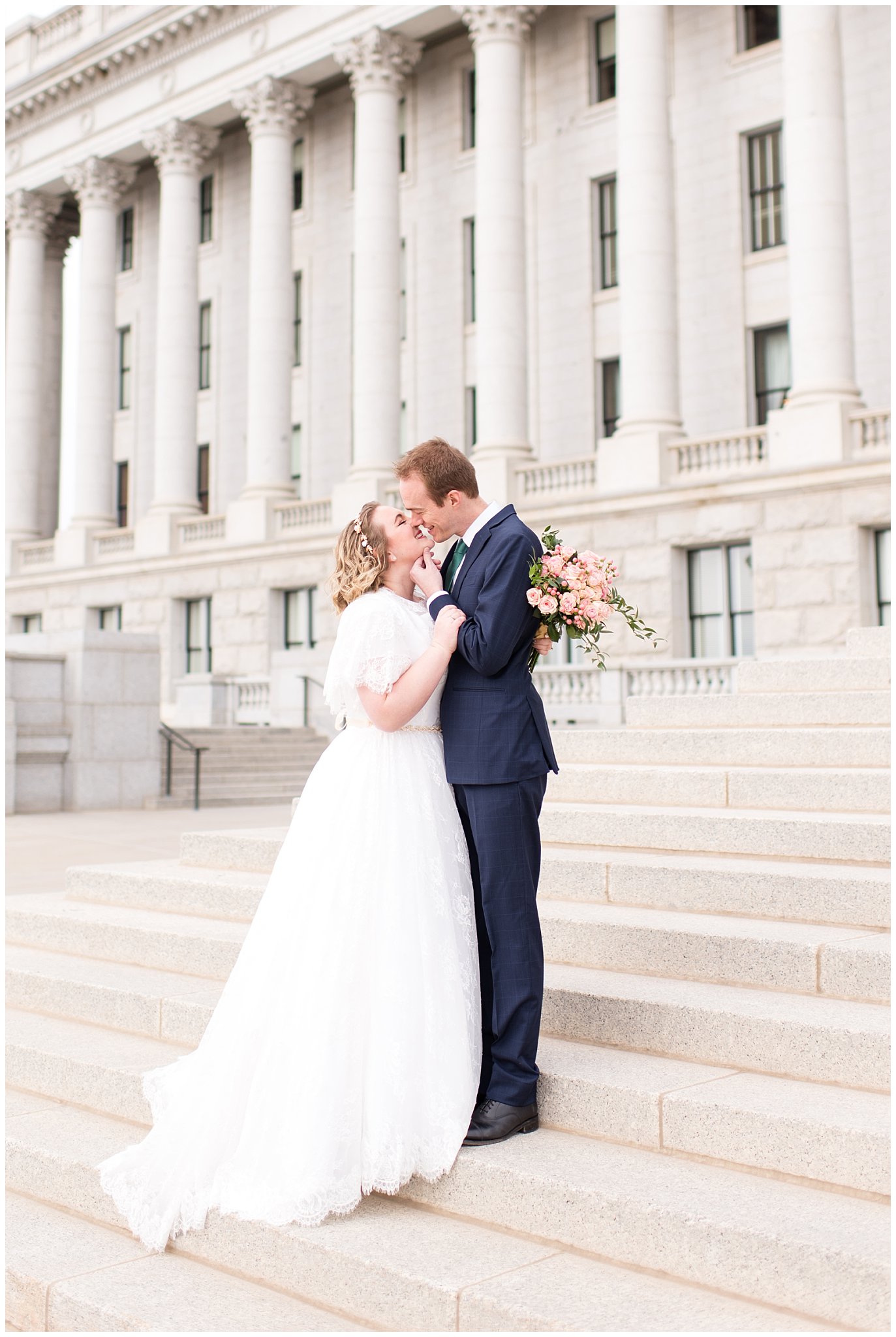 Bride and groom kiss on capitol steps | Winter Formals at the Utah State Capitol | Utah Wedding Photography