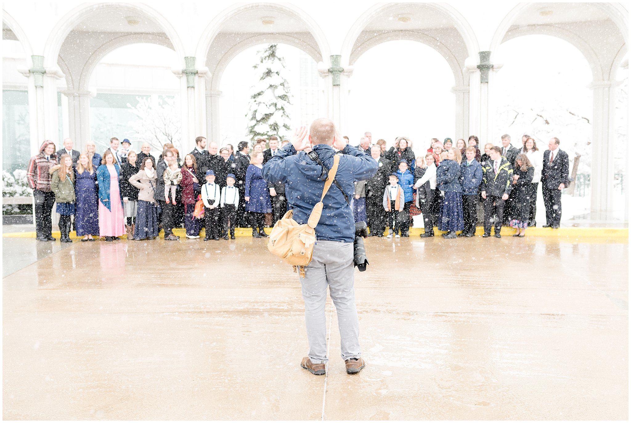 Utah Photographers outside of Bountiful Temple in a blizzard | Husband and Wife Photography Team | Jessie and Dallin Photography