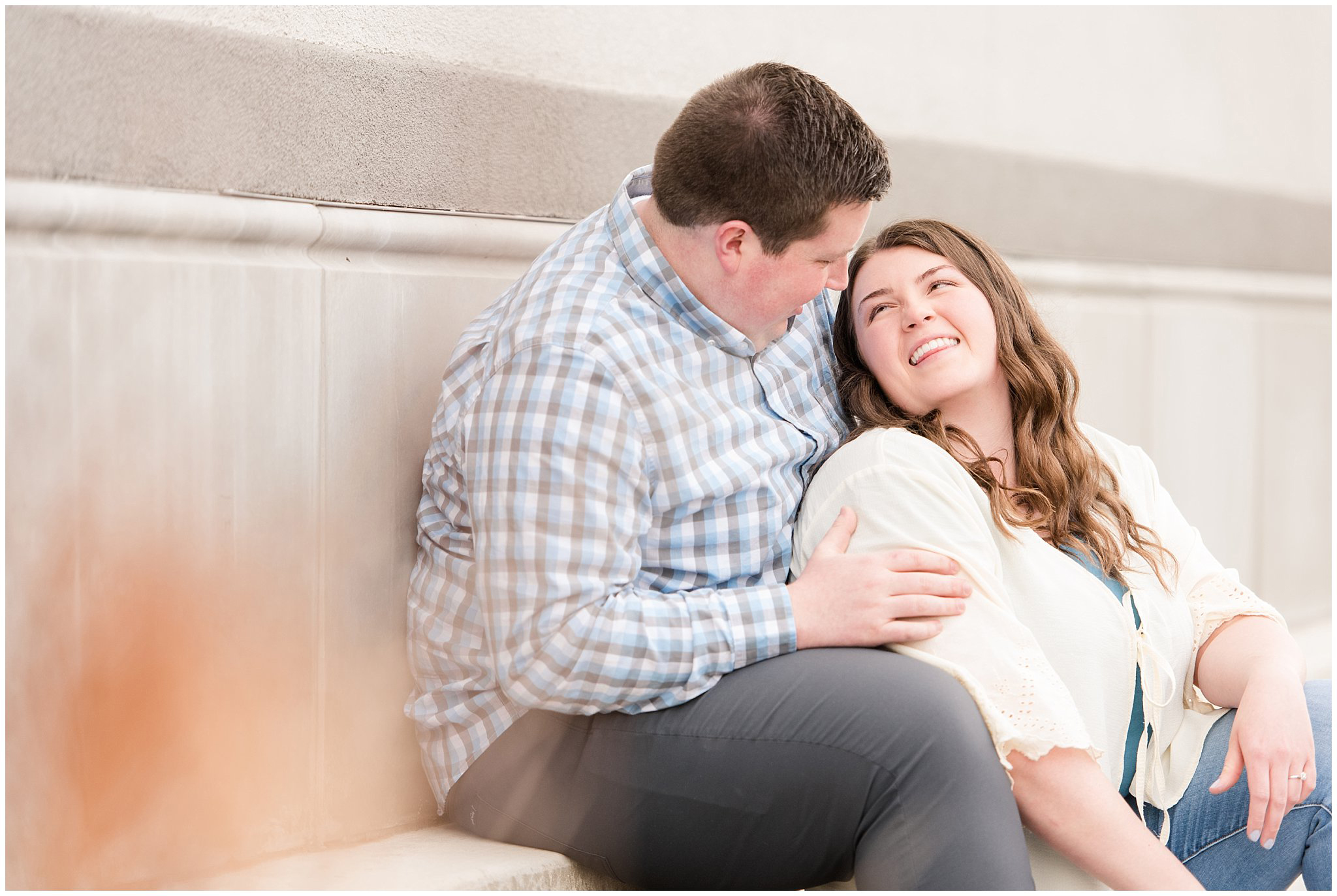 Couple dressed in light blue and white urban engagements | Downtown Logan and Green Canyon Engagements | Utah Wedding Photographers | Jessie and Dallin Photography