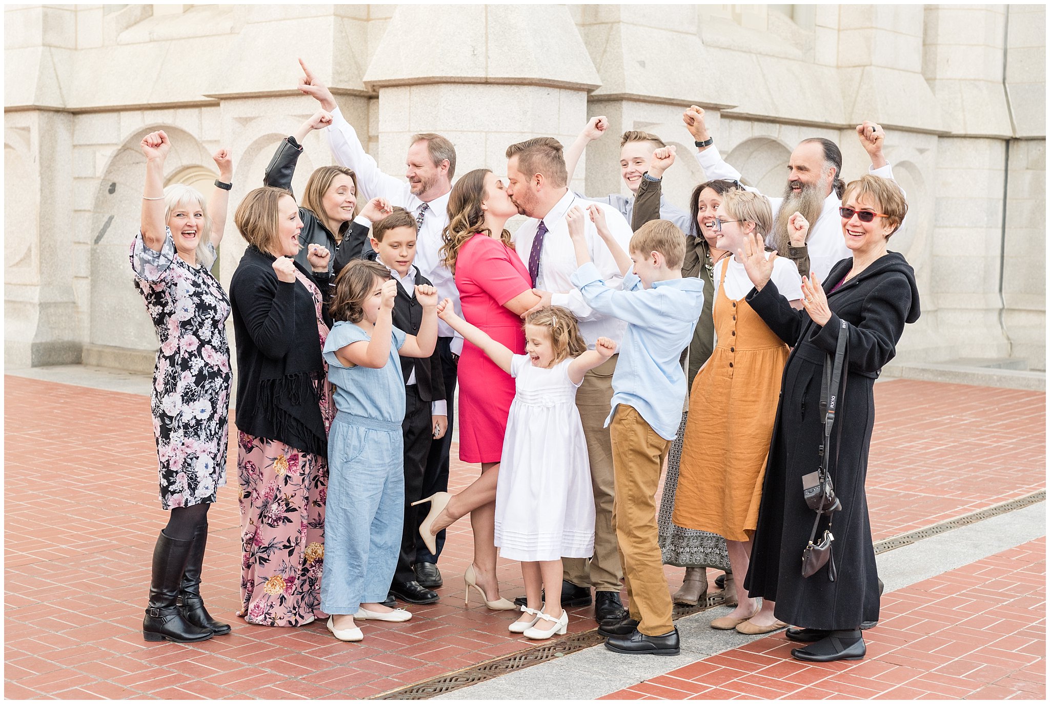 Family cheers as couple kisses after wedding | | Salt Lake Temple Sealing | Jessie and Dallin Photography