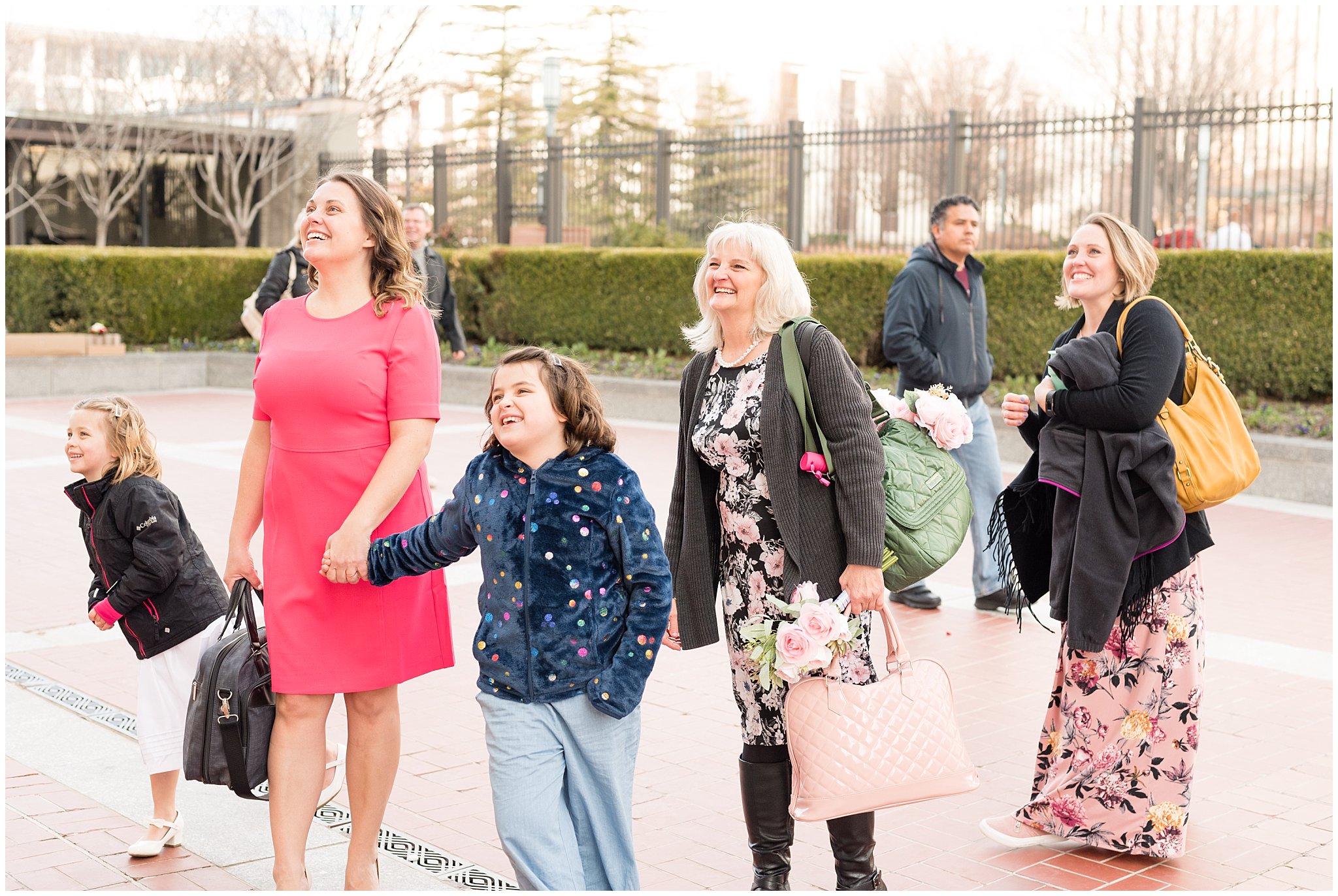 Family candid moment laughing at the Salt Lake Temple | Salt Lake Temple Sealing | Jessie and Dallin Photography