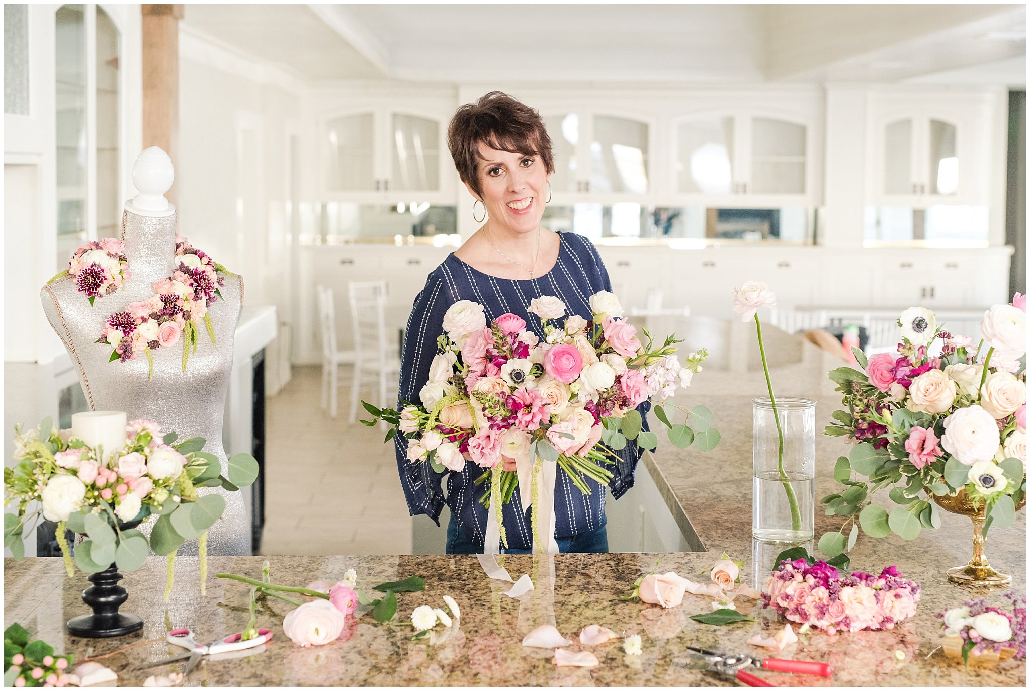 Florist surrounded by flowers | Dancing Daisies Floral | Jessie and Dallin Photography