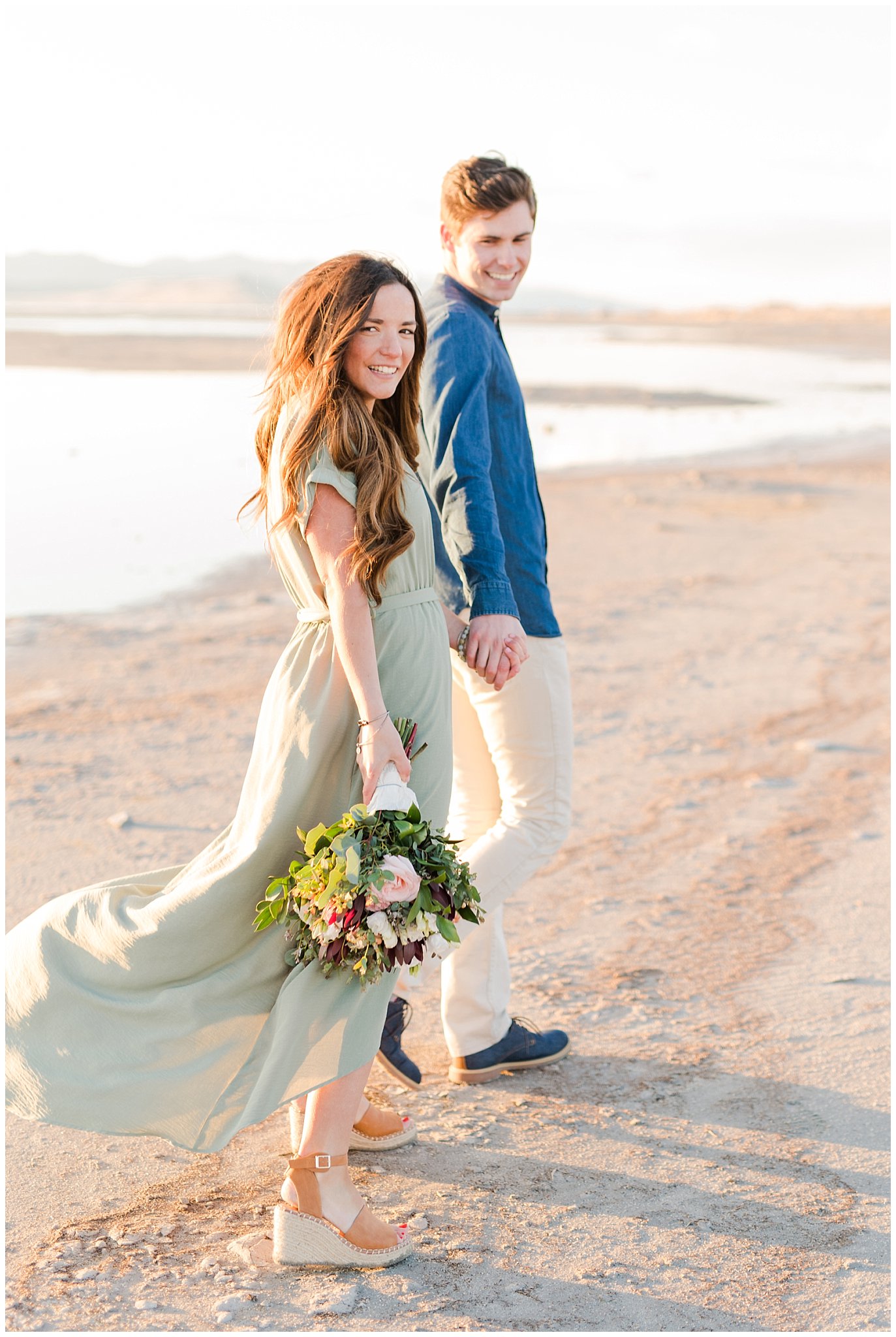 Couple walking on Antelope Island beach | Antelope Island Engagements | Utah Wedding Photographers | Jessie and Dallin Photography