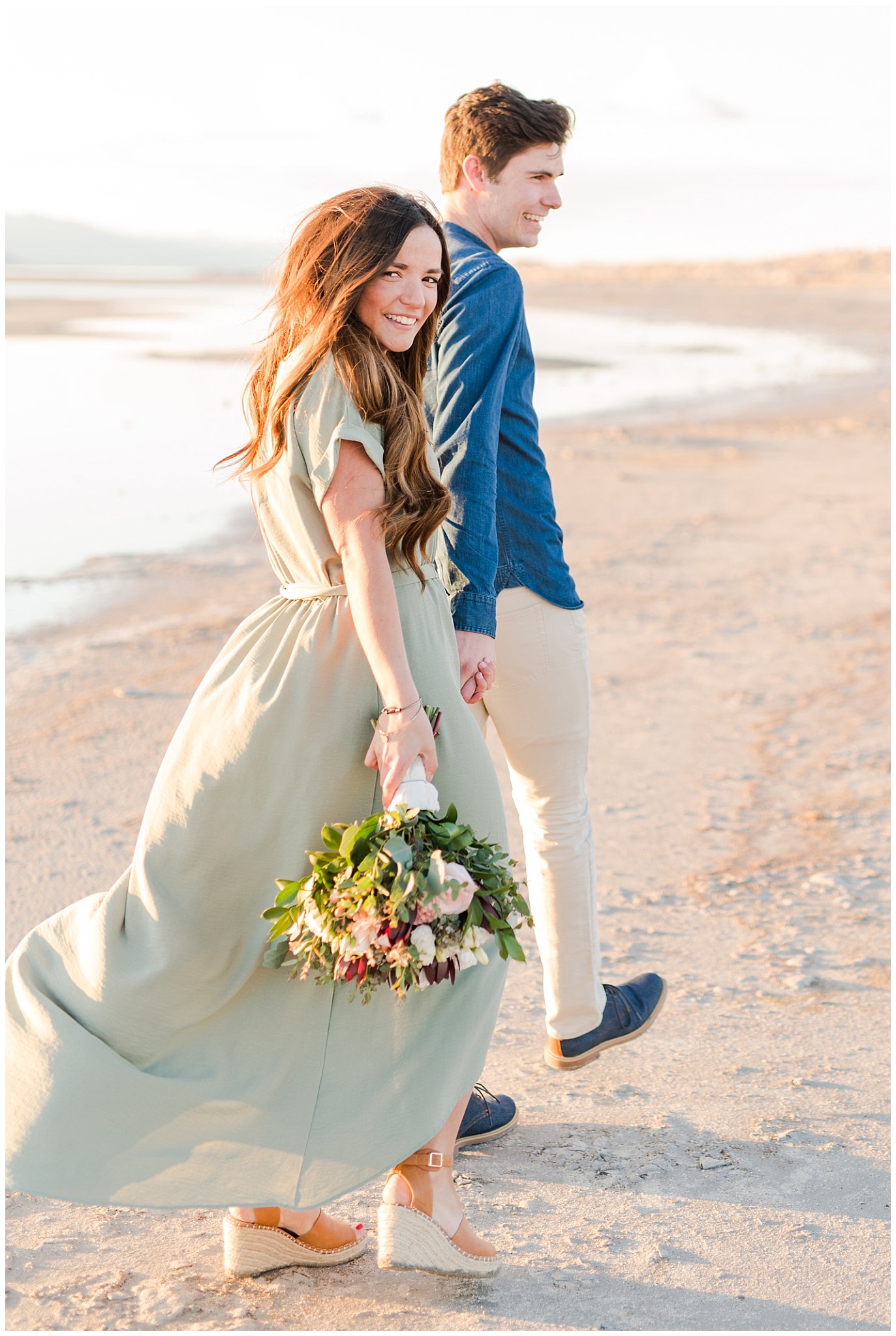 Couple walking on Antelope Island beach | Antelope Island Engagements | Utah Wedding Photographers | Jessie and Dallin Photography