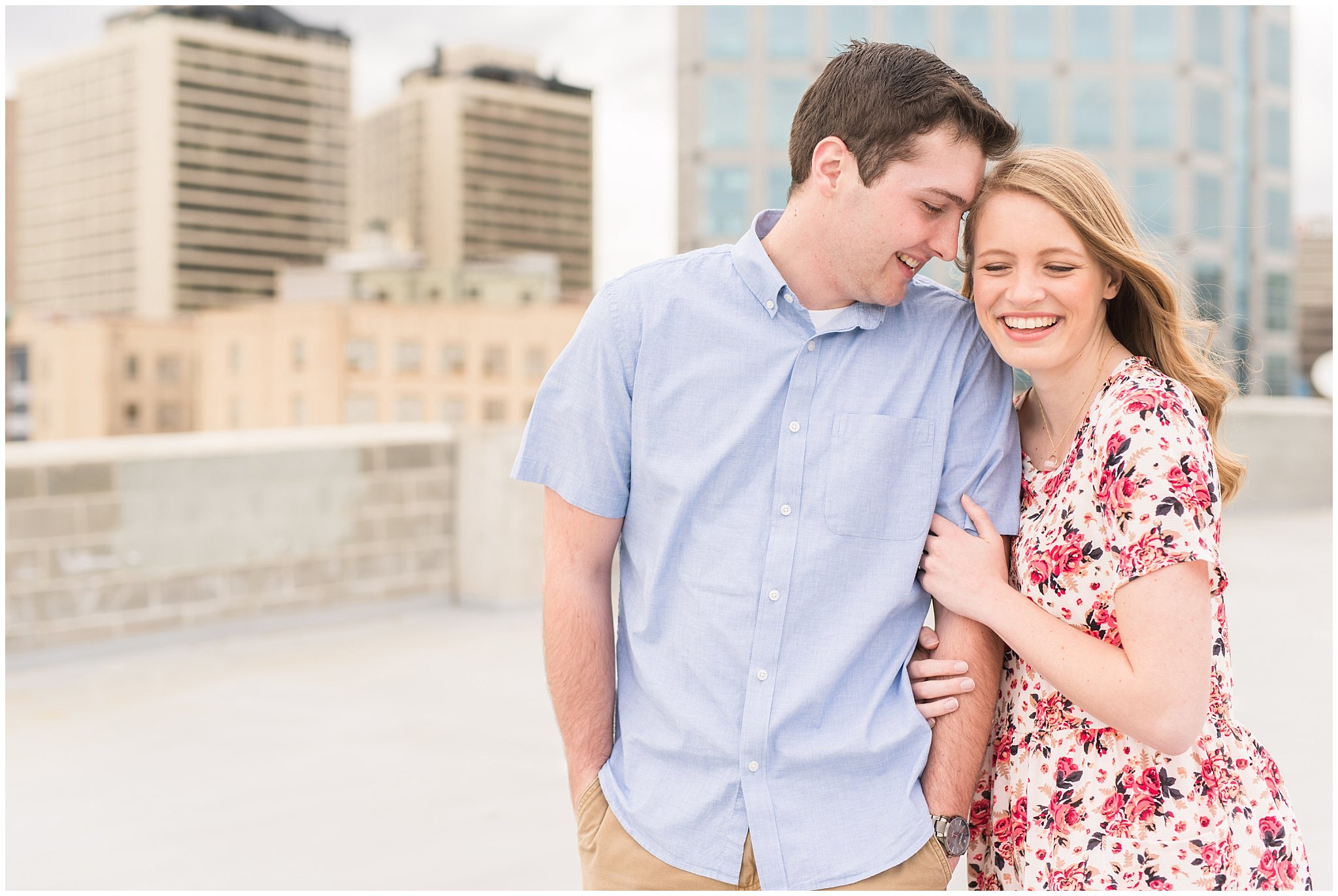 Couple on rooftop | Downtown Salt Lake and Ensign Peak Engagement | Utah Wedding Photographers | Jessie and Dallin Photography