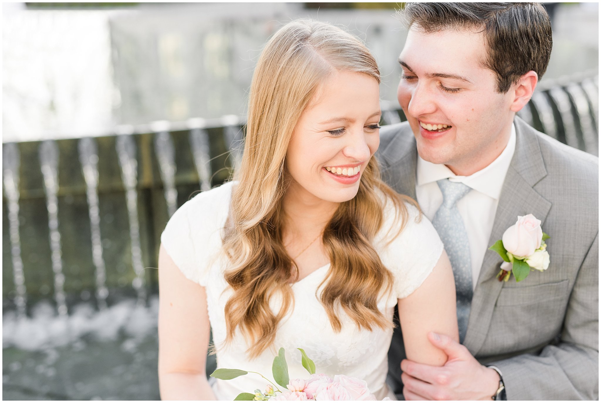 Bride with blush bouquet and groom with grey suit by capitol reflection pool | Utah State Capitol Blossoms Formal Session | Salt Lake Wedding Photographers | Jessie and Dallin Photography