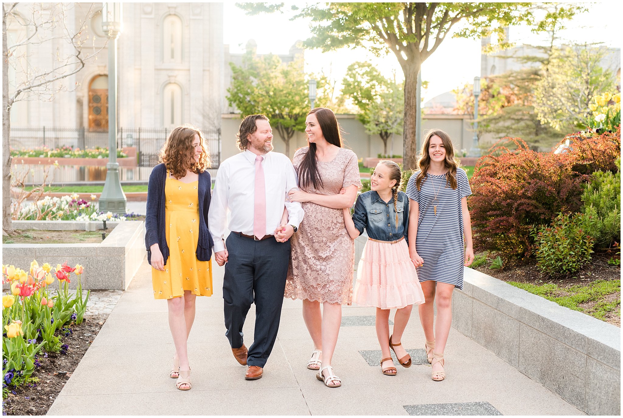 Family dressed up in blush, blue, and yellow after spring temple sealing | Sealing at the Salt Lake Temple and Grand America | Jessie and Dallin Photography