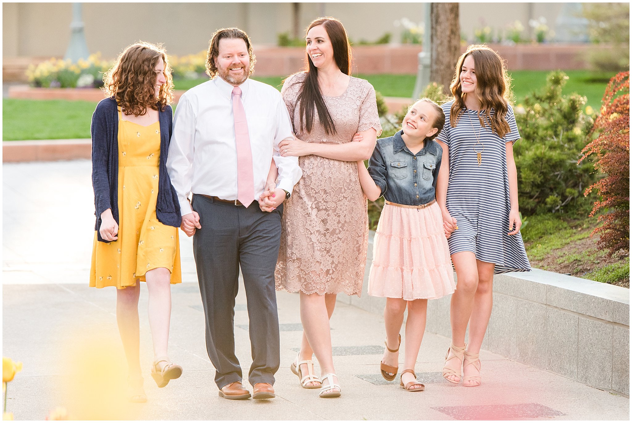 Family dressed up in blush, blue, and yellow after spring temple sealing | Sealing at the Salt Lake Temple and Grand America | Jessie and Dallin Photography