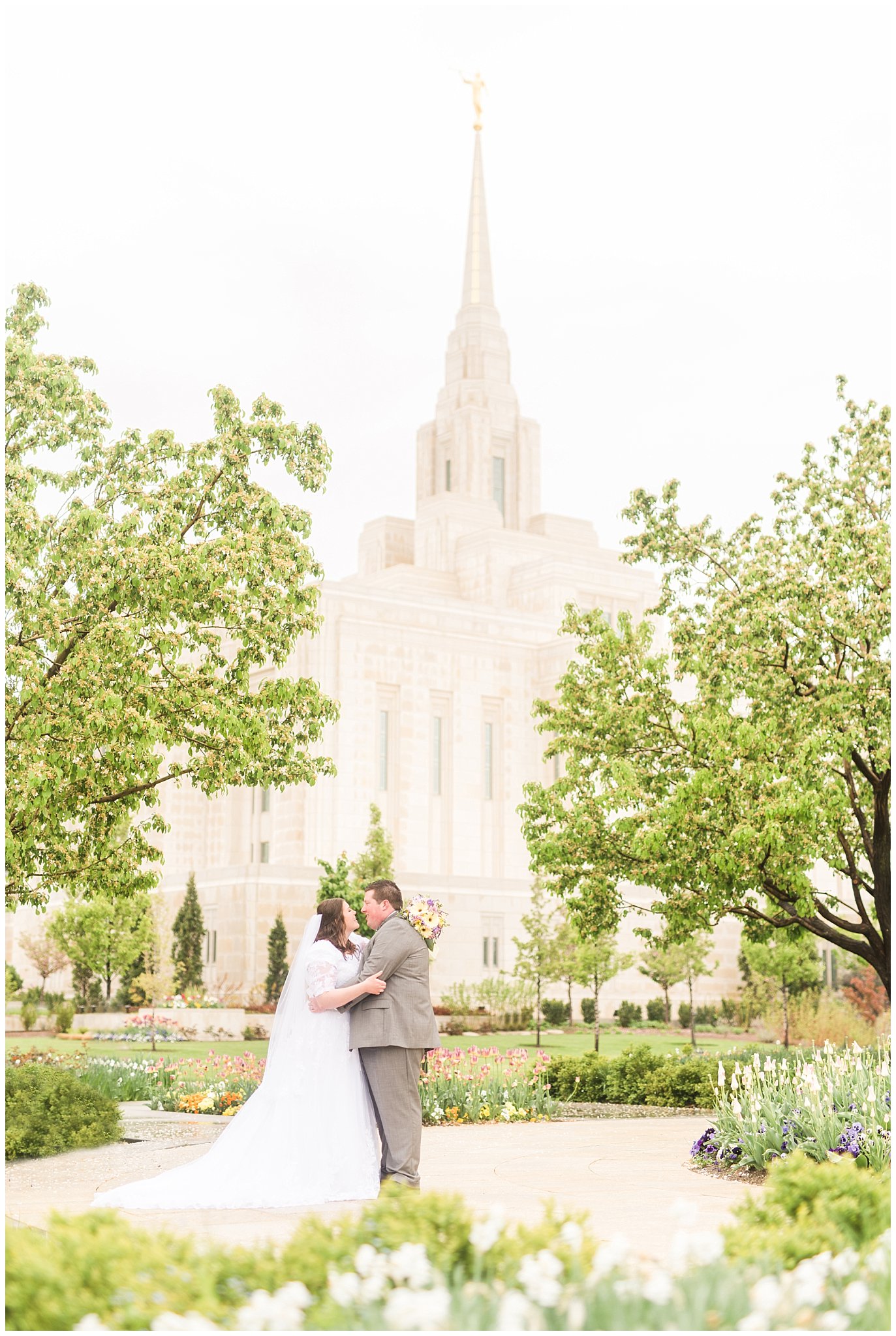 Bride and groom during rainy spring wedding at the Ogden Temple | Utah Wedding | Jessie and Dallin Photography