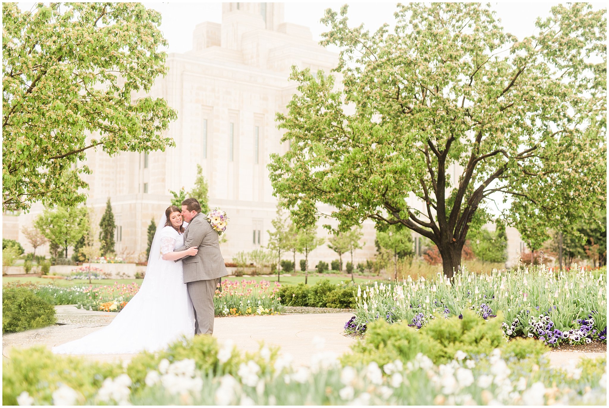 Bride and groom during rainy spring wedding at the Ogden Temple | Utah Wedding | Jessie and Dallin Photography