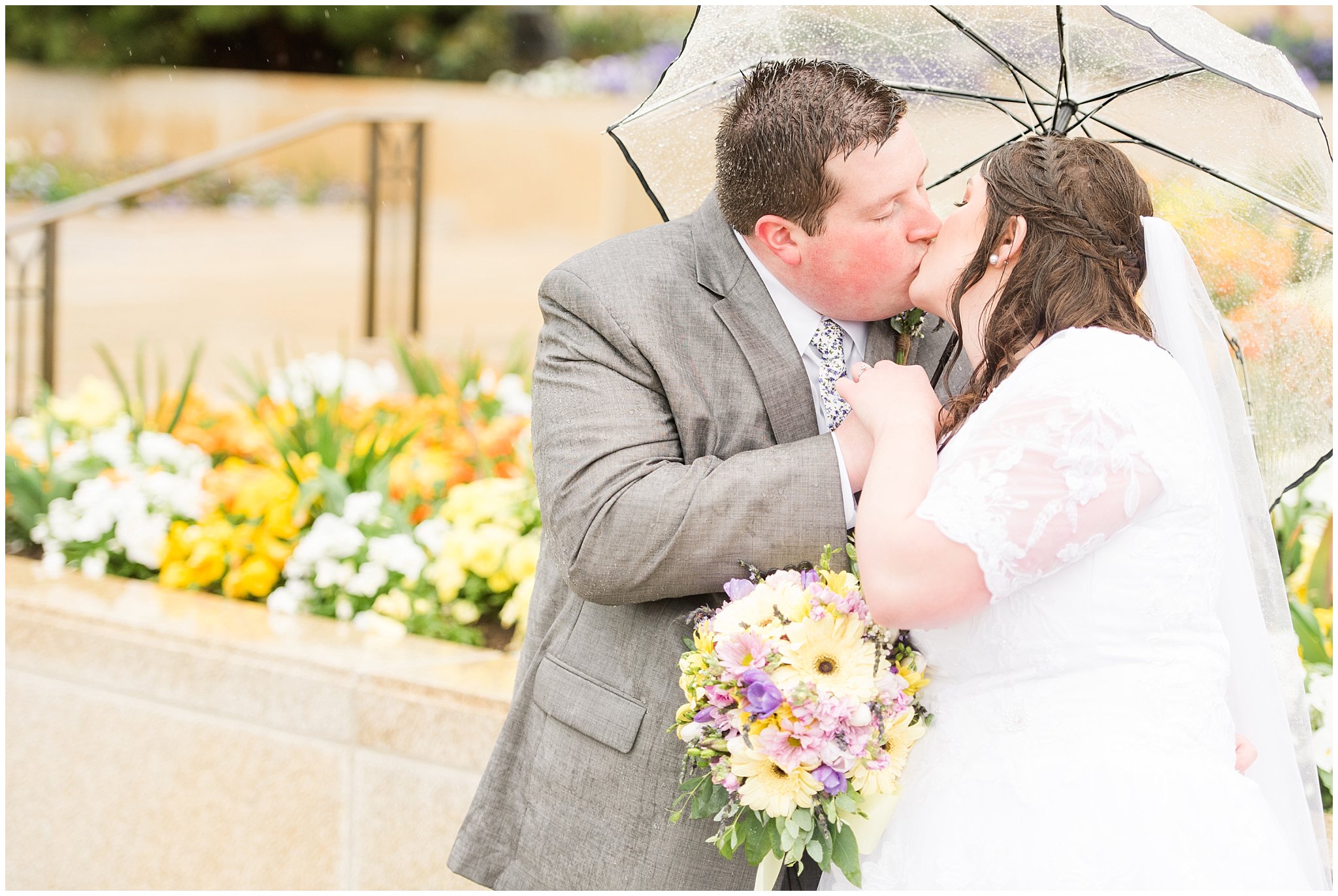 Bride and groom during rainy spring wedding at the Ogden Temple | Utah Wedding | Jessie and Dallin Photography