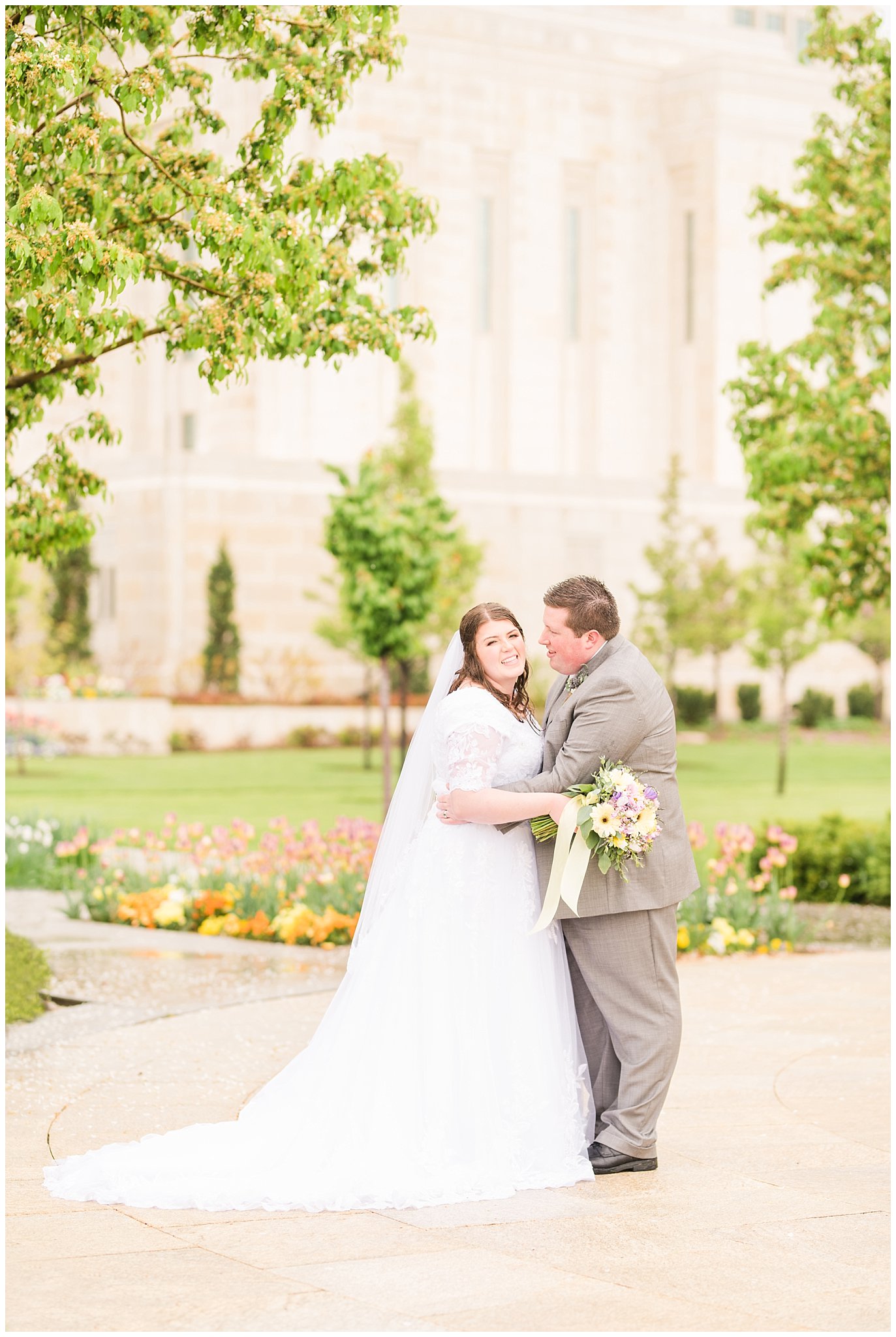 Bride and groom during rainy spring wedding at the Ogden Temple | Utah Wedding | Jessie and Dallin Photography