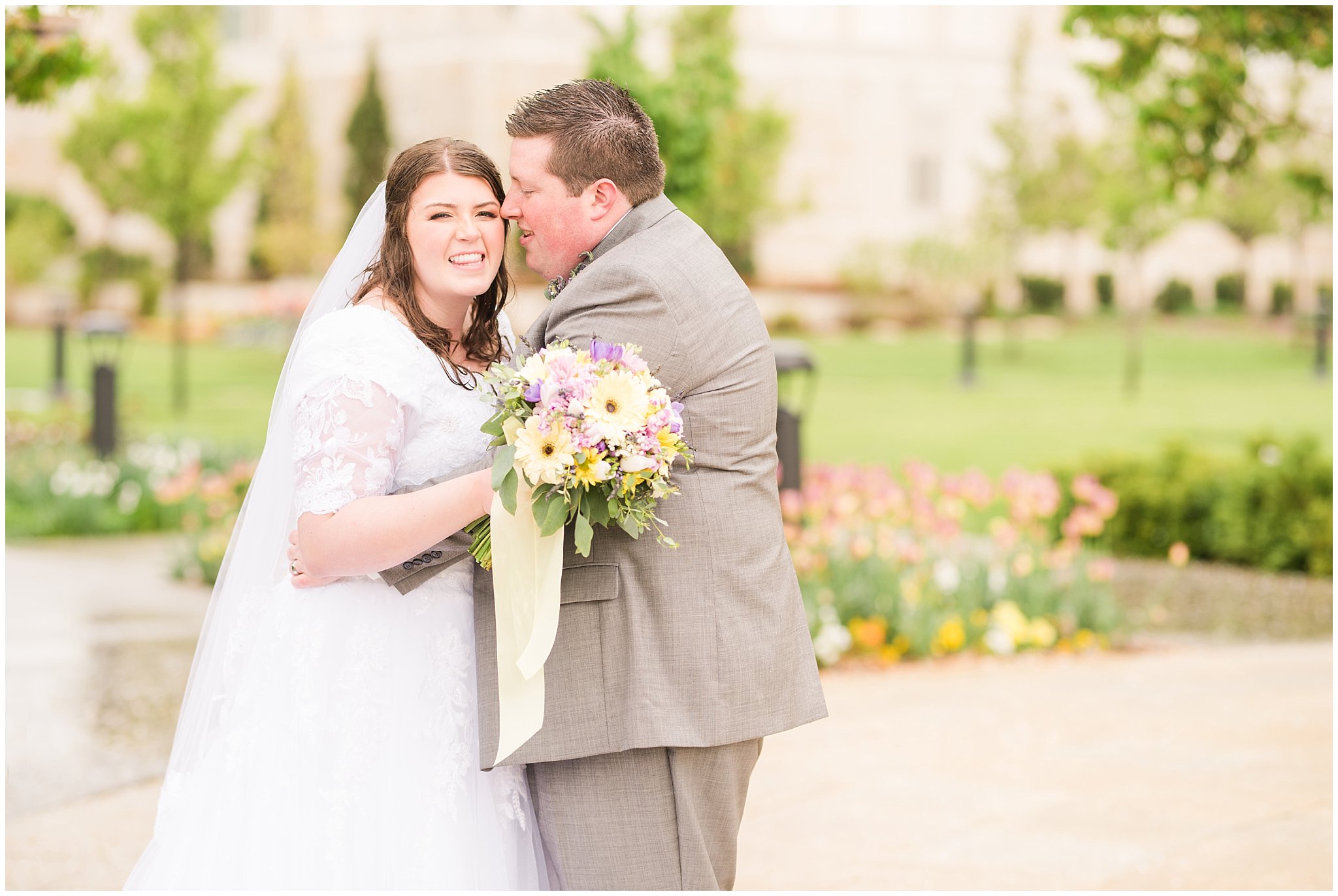 Bride and groom during rainy spring wedding at the Ogden Temple | Utah Wedding | Jessie and Dallin Photography