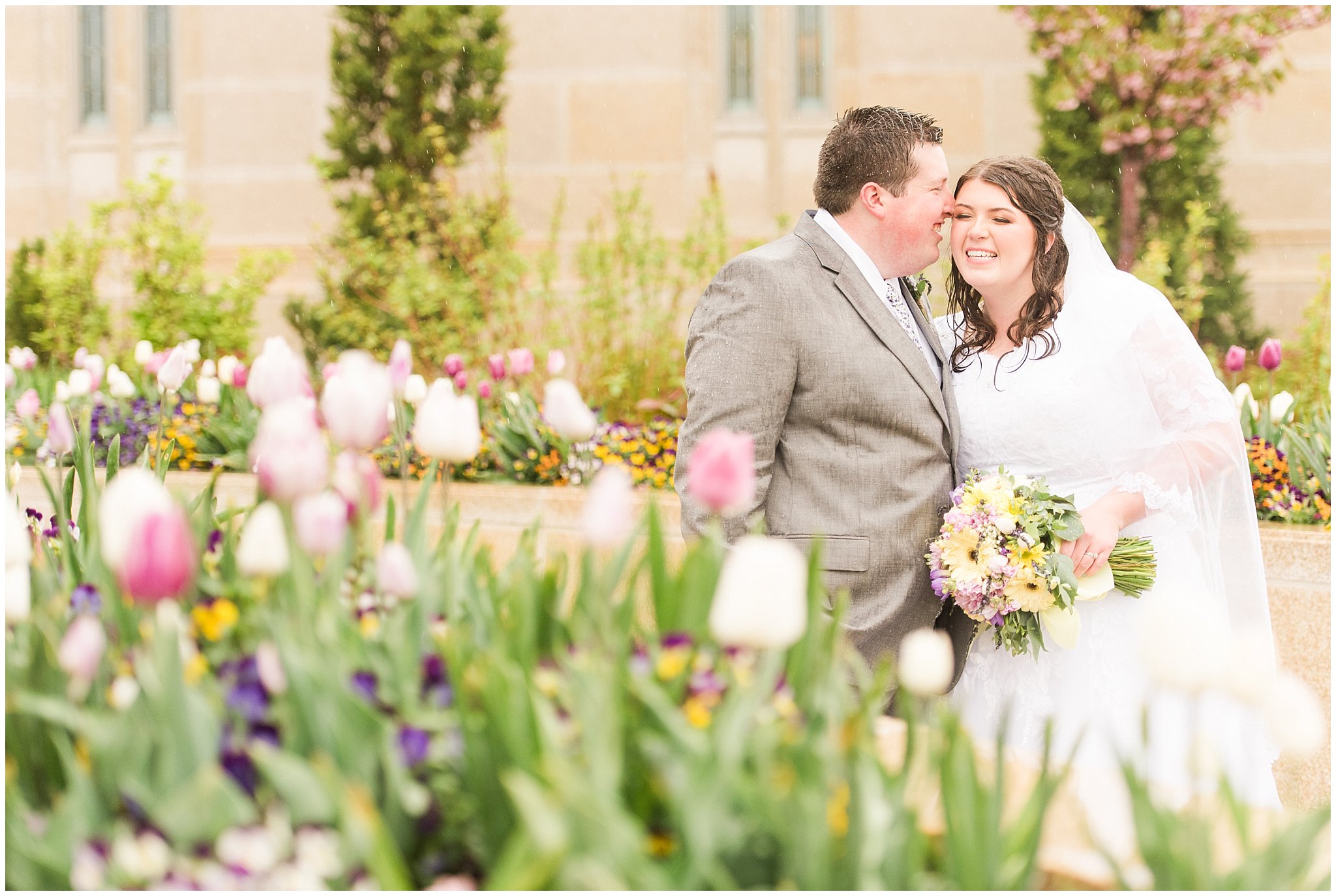 Bride and groom during rainy spring wedding at the Ogden Temple | Utah Wedding | Jessie and Dallin Photography