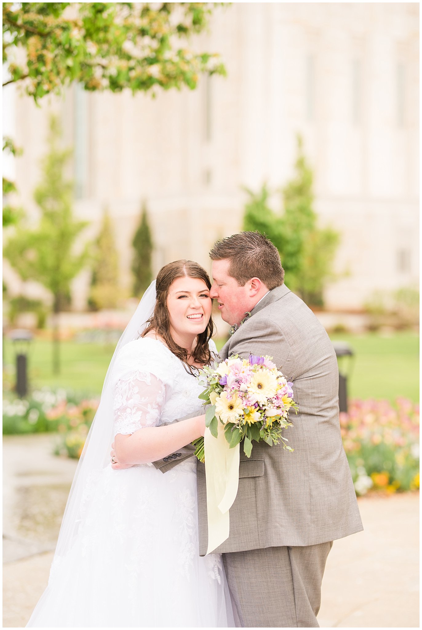 Bride and groom during rainy spring wedding at the Ogden Temple | Utah Wedding | Jessie and Dallin Photography