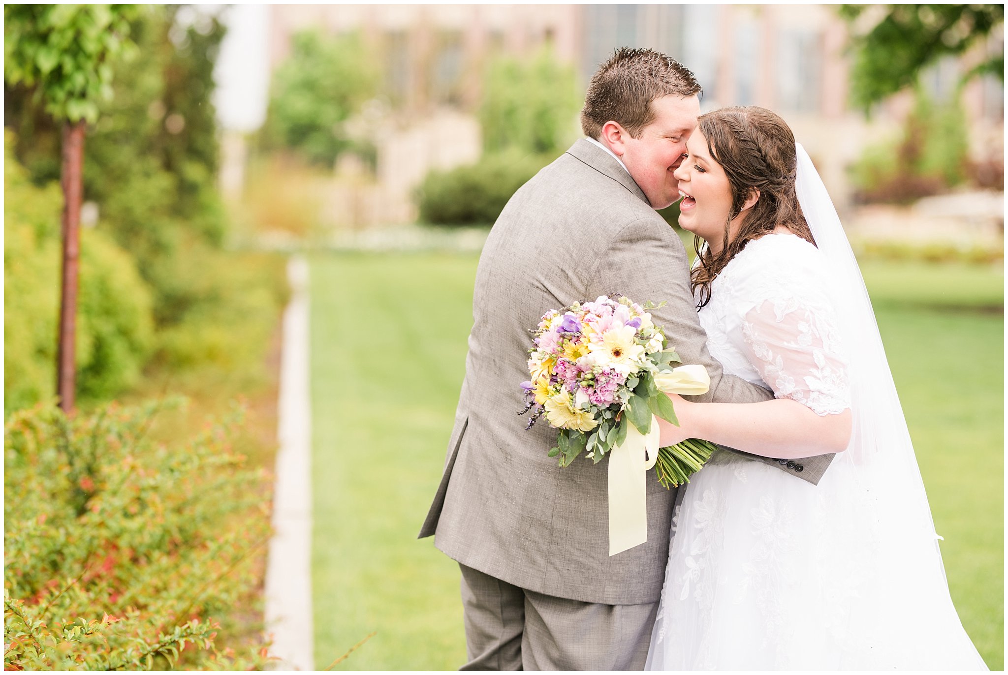 Bride and groom during rainy spring wedding at the Ogden Temple | Utah Wedding | Jessie and Dallin Photography