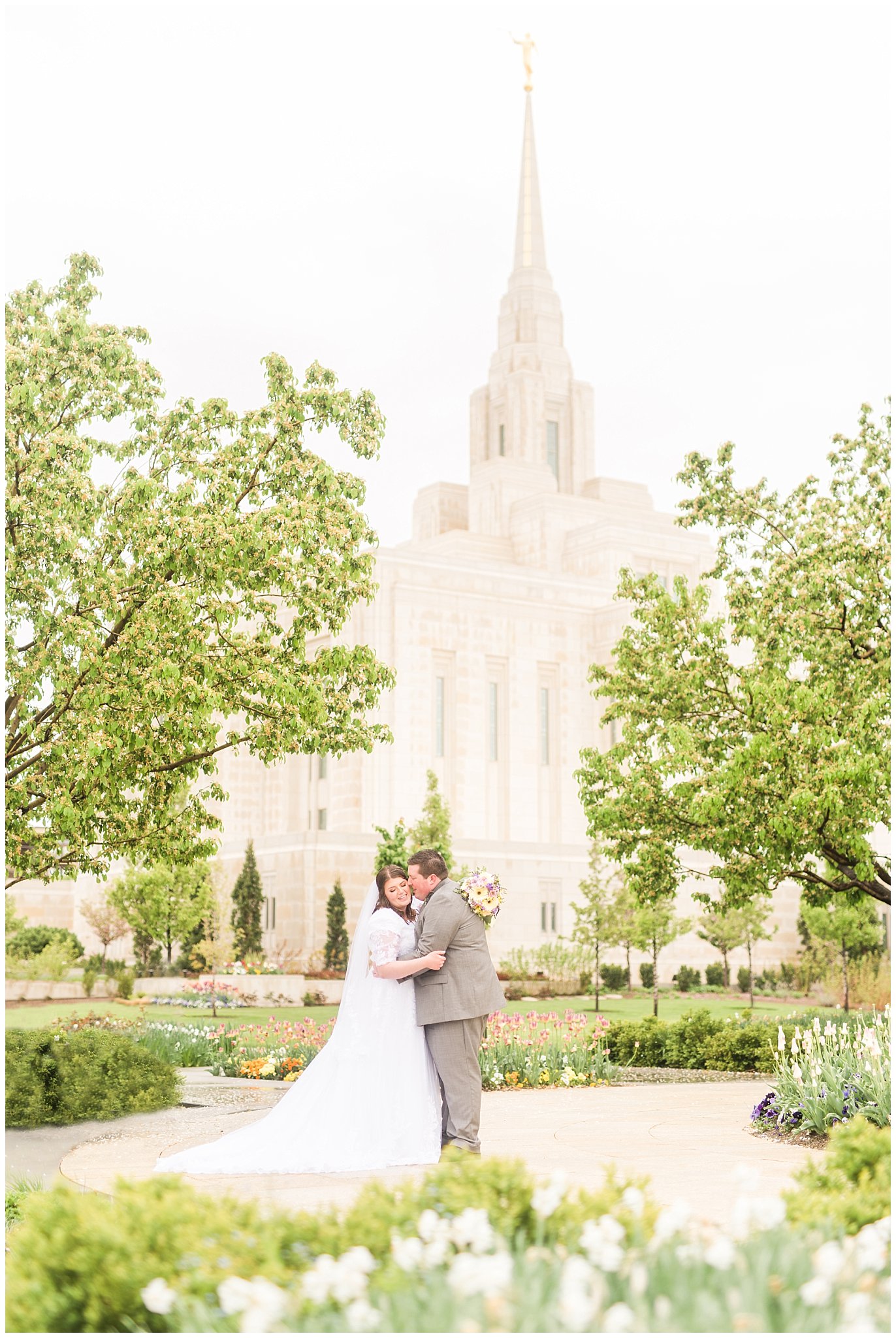 Bride and groom during rainy spring wedding at the Ogden Temple | Utah Wedding | Jessie and Dallin Photography