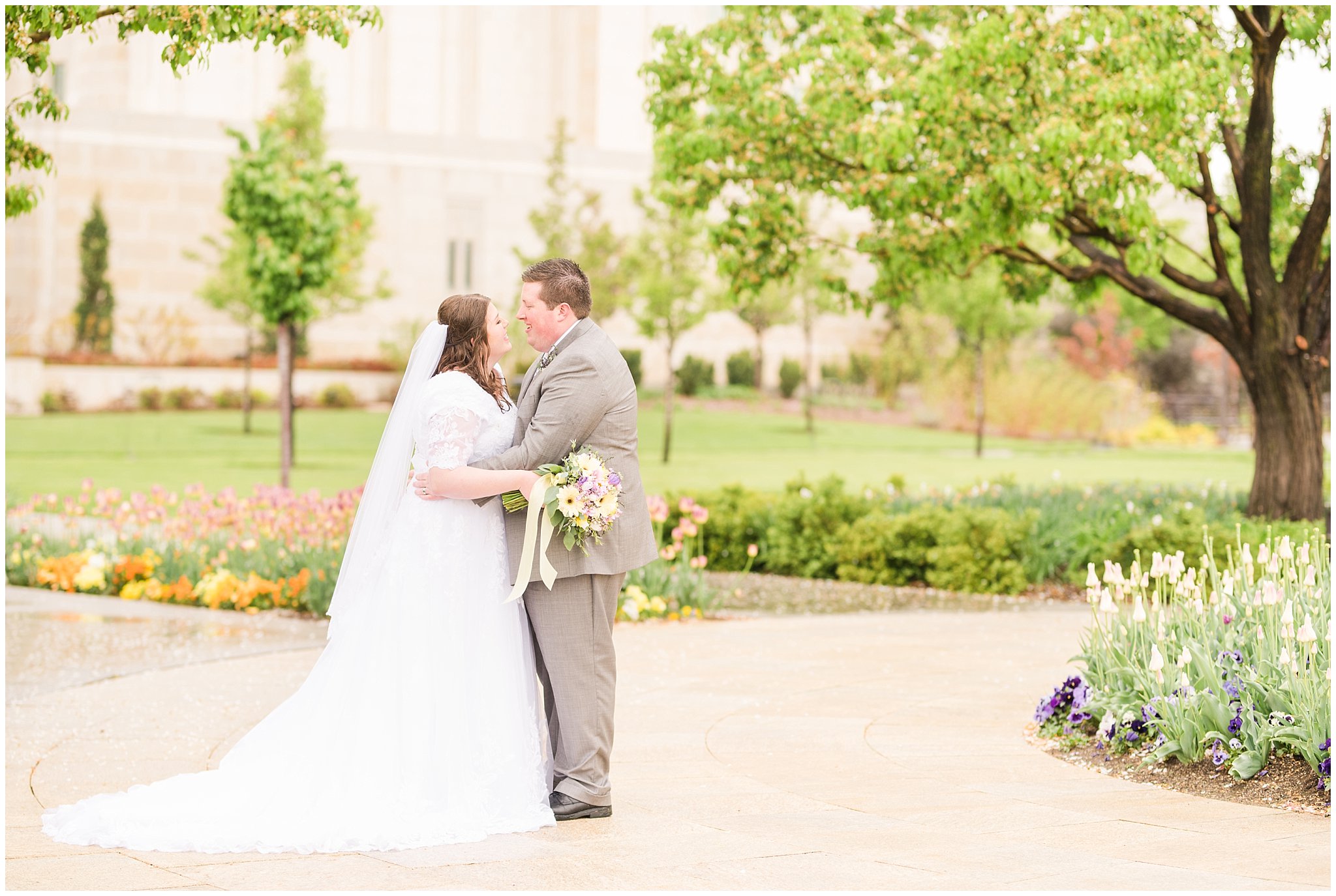 Bride and groom during rainy spring wedding at the Ogden Temple | Utah Wedding | Jessie and Dallin Photography