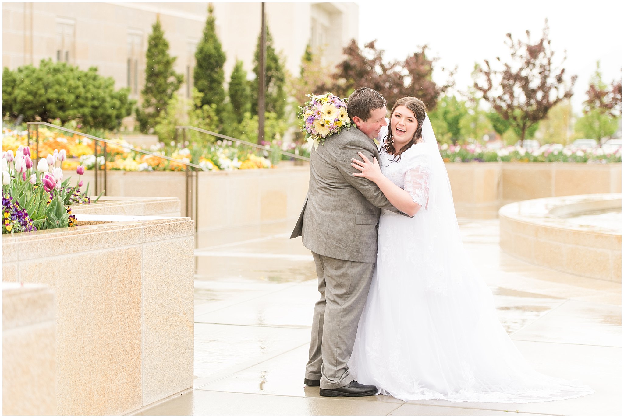 Bride and groom during rainy spring wedding at the Ogden Temple | Utah Wedding | Jessie and Dallin Photography