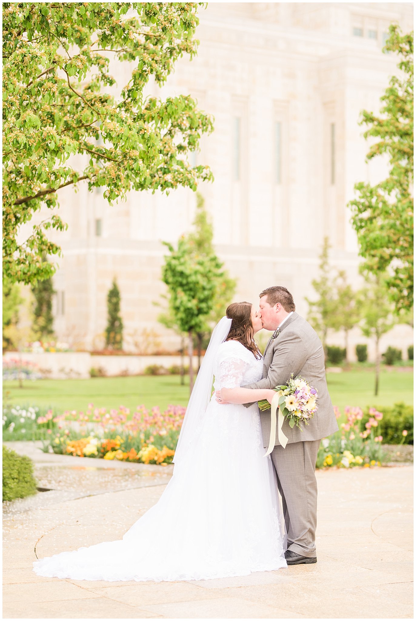 Bride and groom during rainy spring wedding at the Ogden Temple | Utah Wedding | Jessie and Dallin Photography