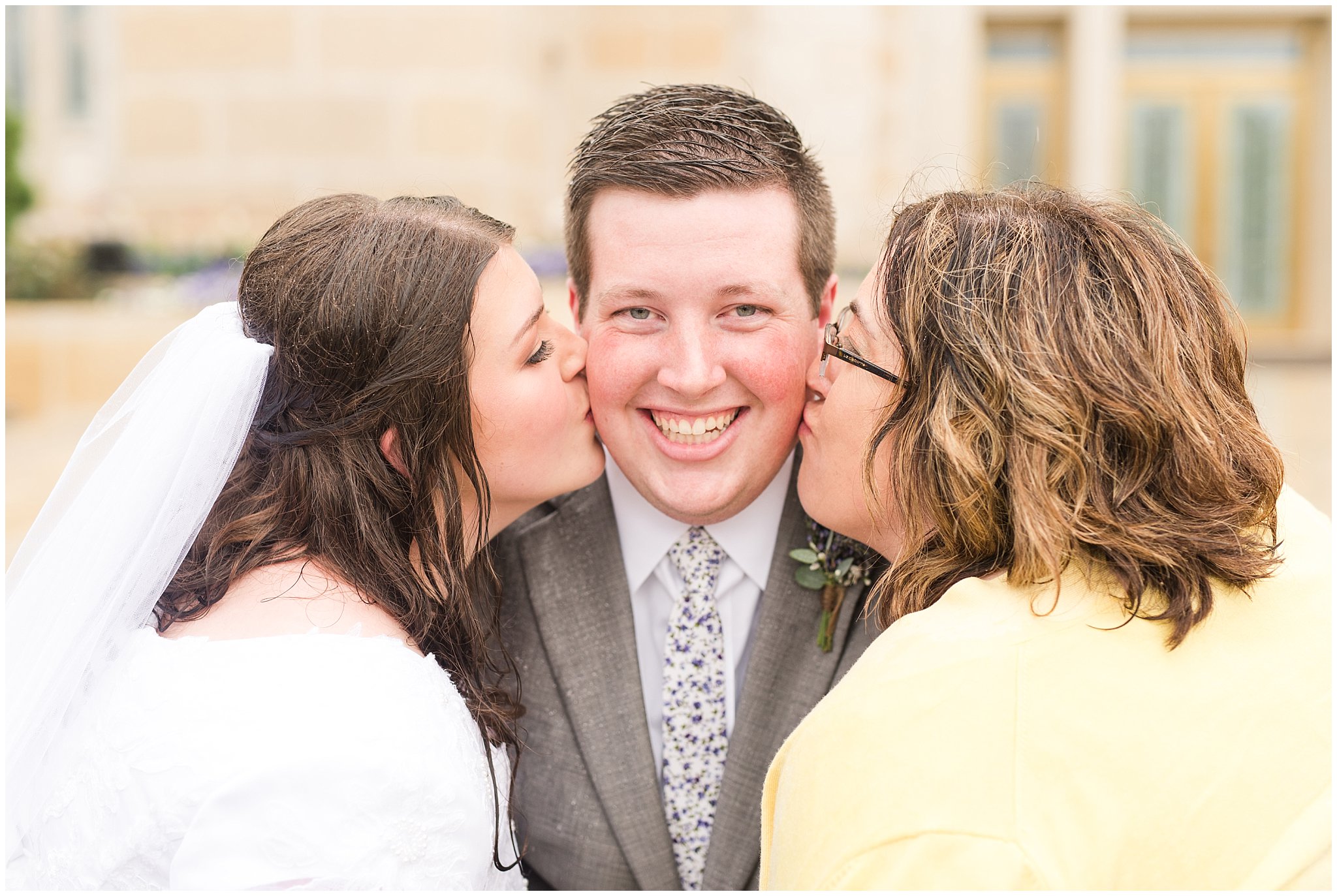 Family portraits during rainy spring wedding at the Ogden Temple | Utah Wedding | Jessie and Dallin Photography