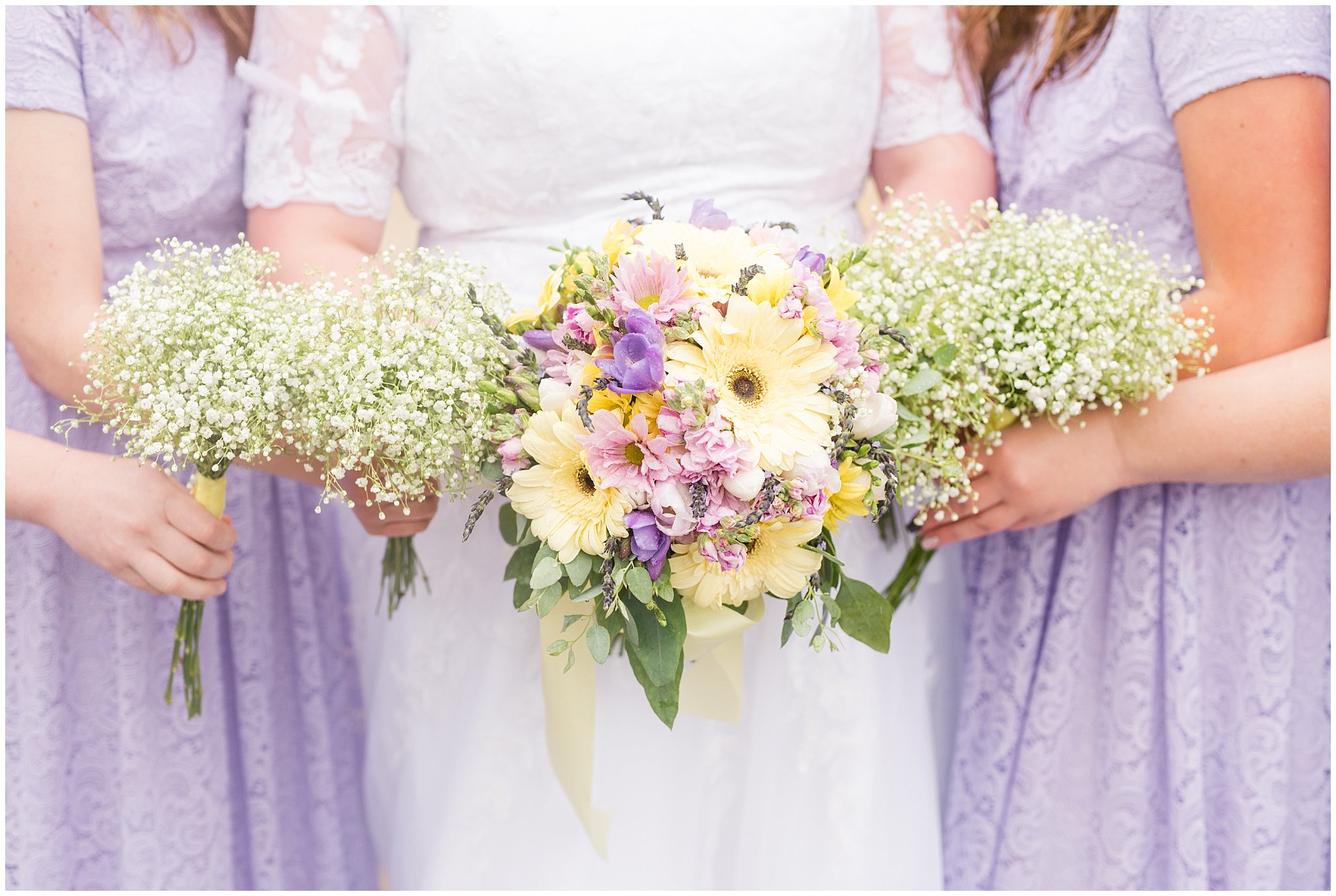 Lavender and yellow bridal party during rainy spring wedding at the Ogden Temple | Utah Wedding | Jessie and Dallin Photography