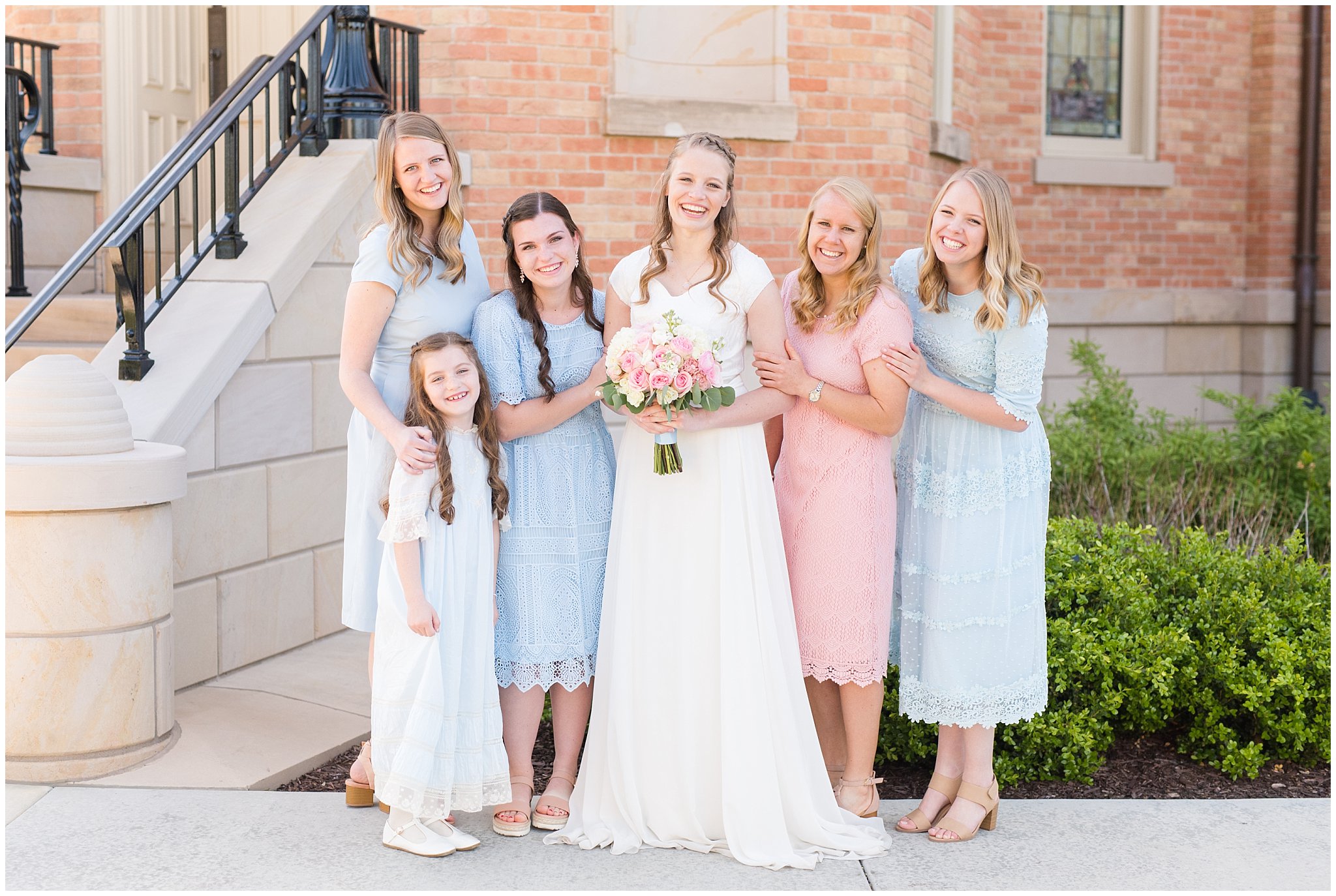 Bridesmaids at Provo City Center temple with grey, blush, and light blue wedding colors | Spring Provo City Center Temple Wedding | Utah Wedding Photographers | Jessie and Dallin Photography