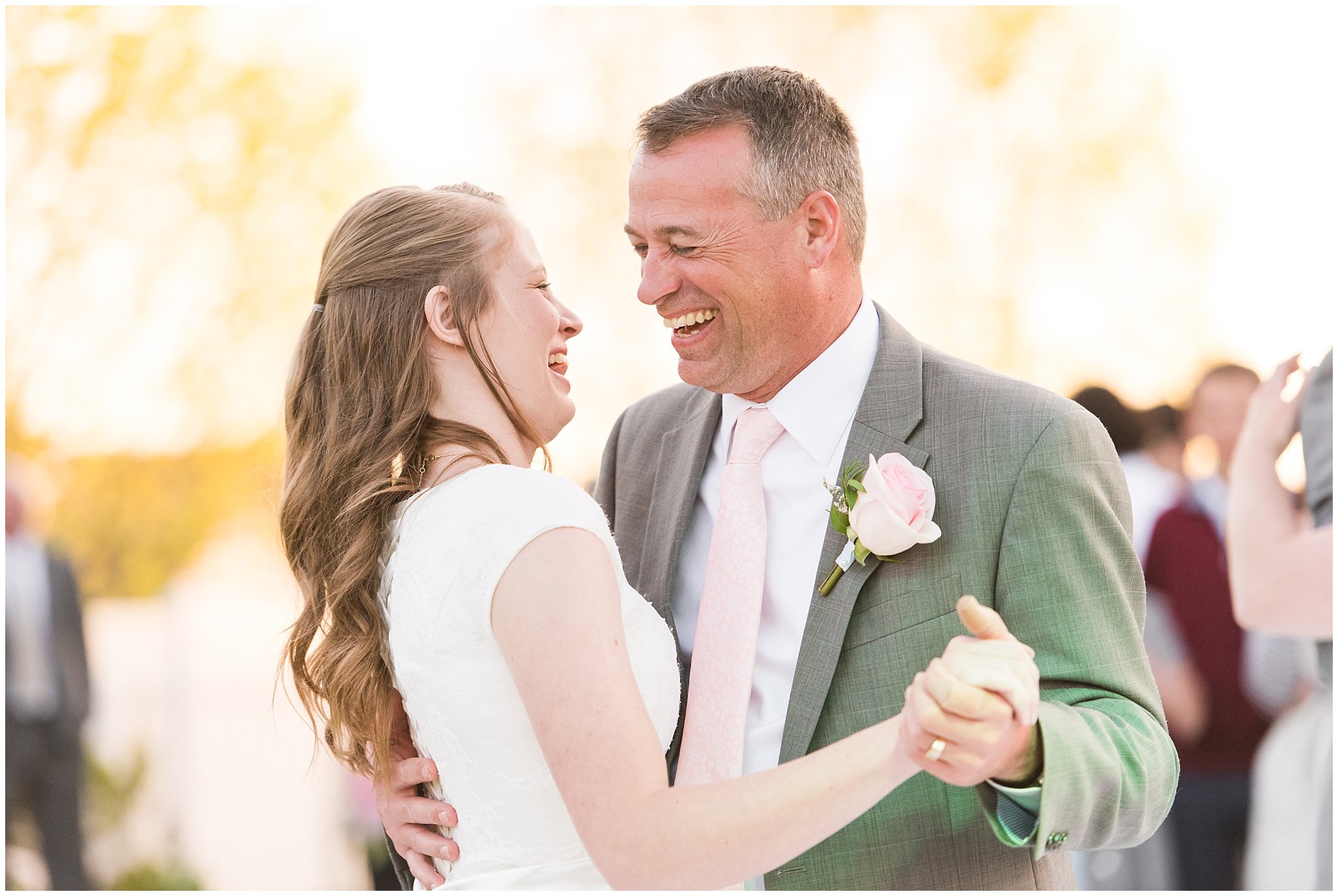 Father daughter dance, joyful and filled with laughter | Backyard outdoor spring wedding with grey, blush, and light blue wedding colors | Spring Provo City Center Temple Wedding | Utah Wedding Photographers | Jessie and Dallin Photography