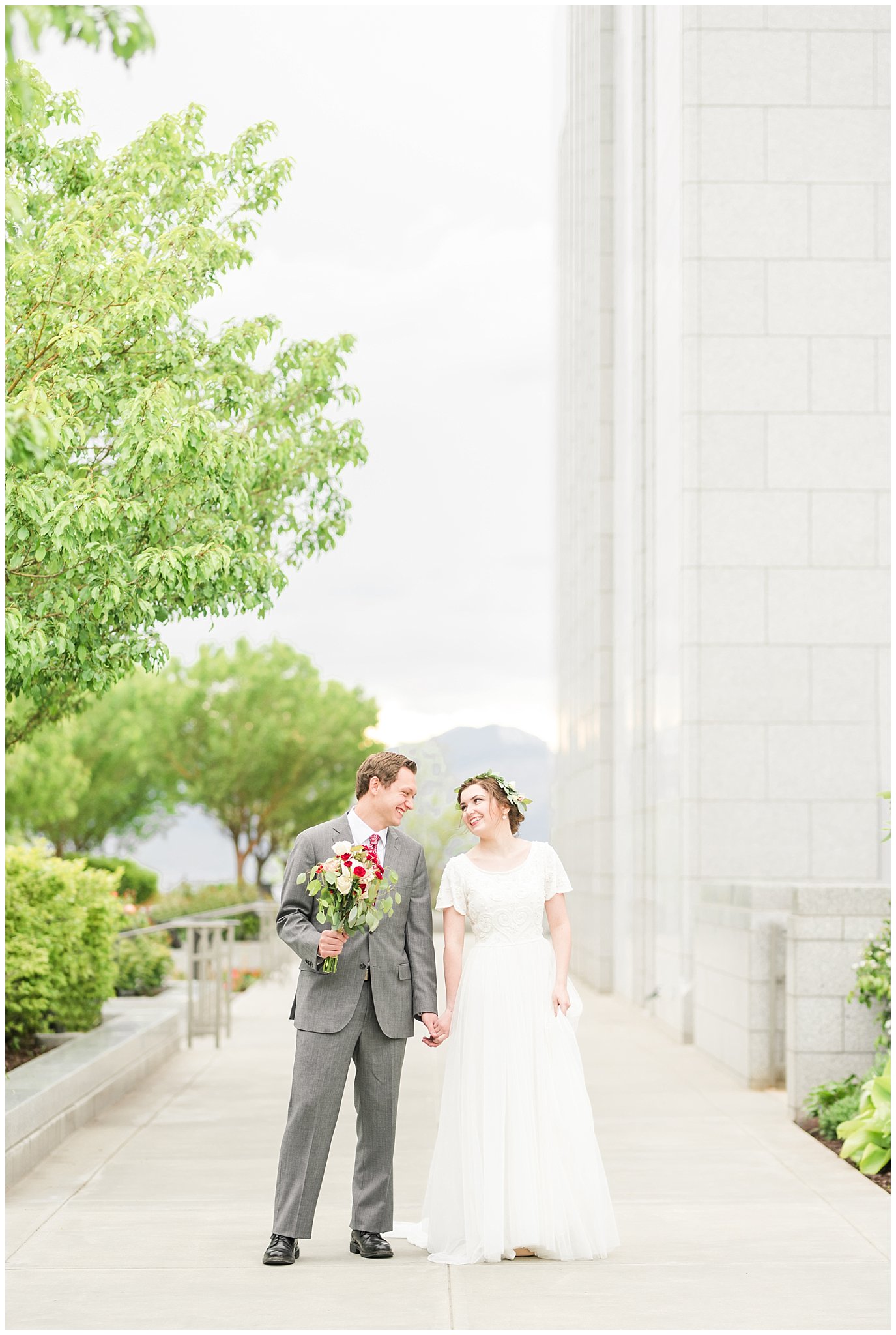 Bride in flower crown and groom in grey suit with maroon tie | Grey, gold, and maroon wedding colors | Draper Temple Spring Formal Session | Jessie and Dallin Photography