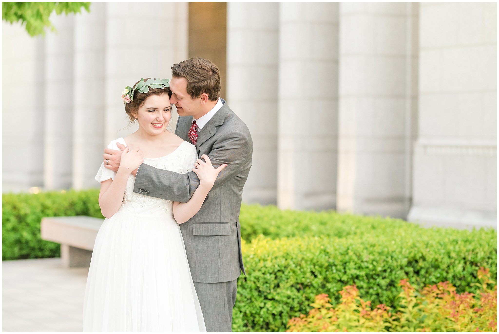 Bride in flower crown and groom in grey suit with maroon tie | Grey, gold, and maroon wedding colors | Draper Temple Spring Formal Session | Jessie and Dallin Photography