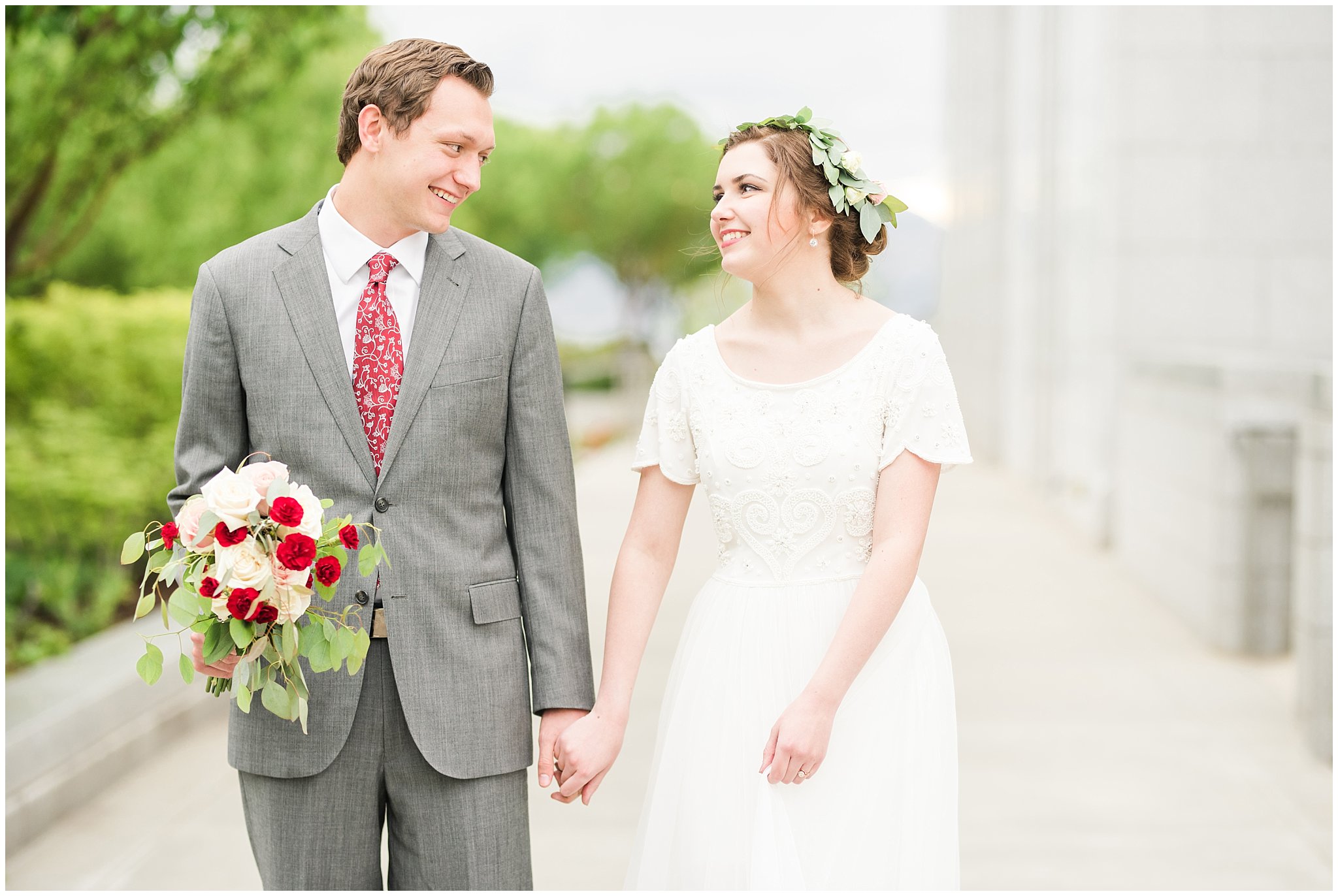 Bride in flower crown and groom in grey suit with maroon tie | Grey, gold, and maroon wedding colors | Draper Temple Spring Formal Session | Jessie and Dallin Photography