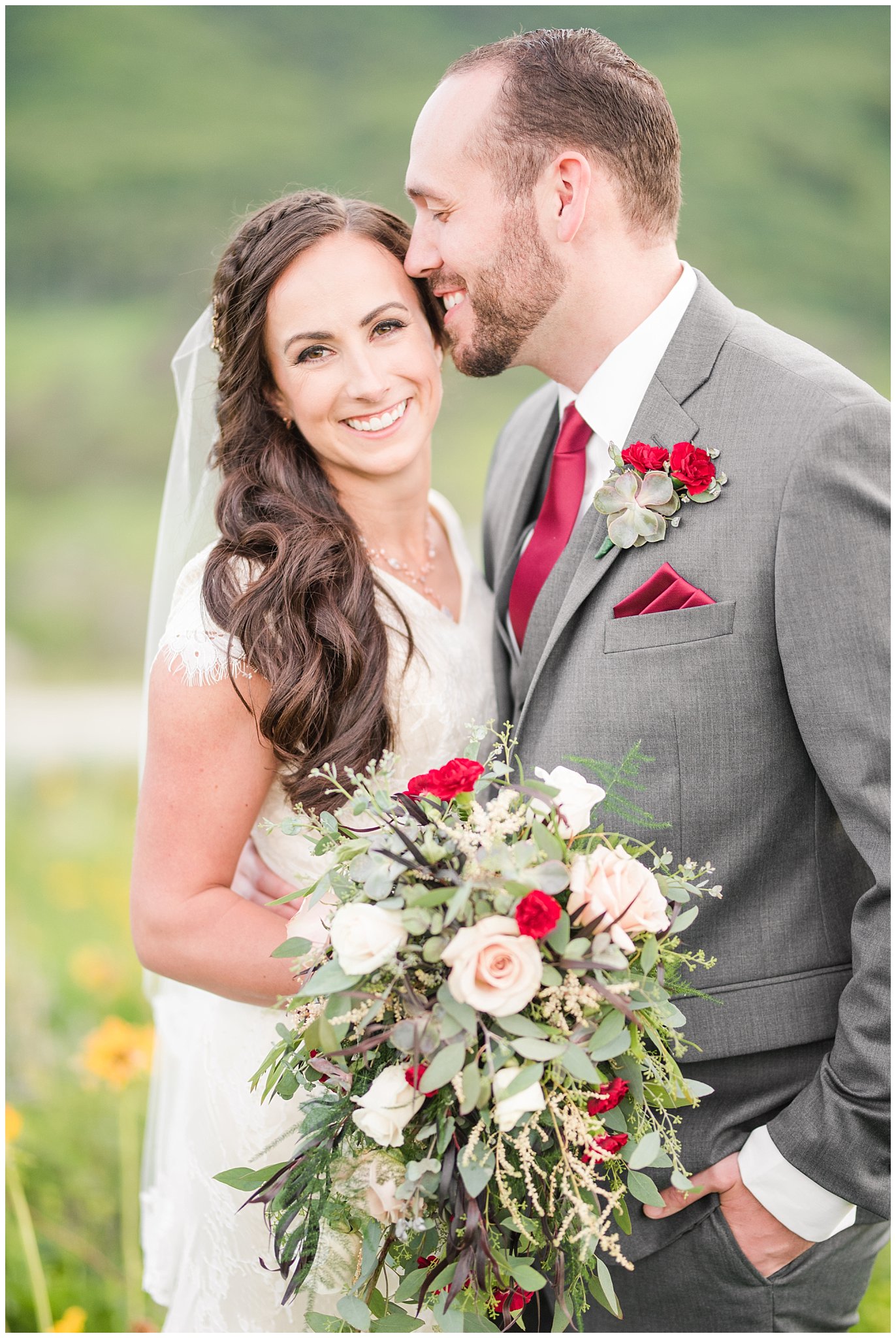 Bride and groom portraits in the mountains | Groom in grey suit and bride in beige and white dress with waterfall bouquet | Snowbasin Summer Formal Session | Utah Wedding Photographers | Jessie and Dallin