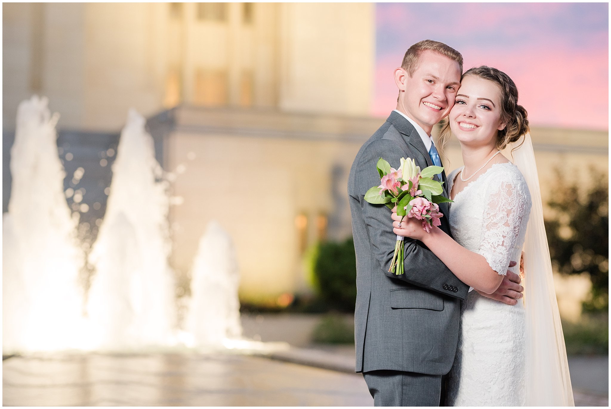 Bride and groom portraits at sunset at the Ogden Temple | Bride in elegant lace dress and veil, groom in grey suit and light blue tie | Ogden Temple Summer Formal Session | Ogden Temple Wedding | Jessie and Dallin Photography