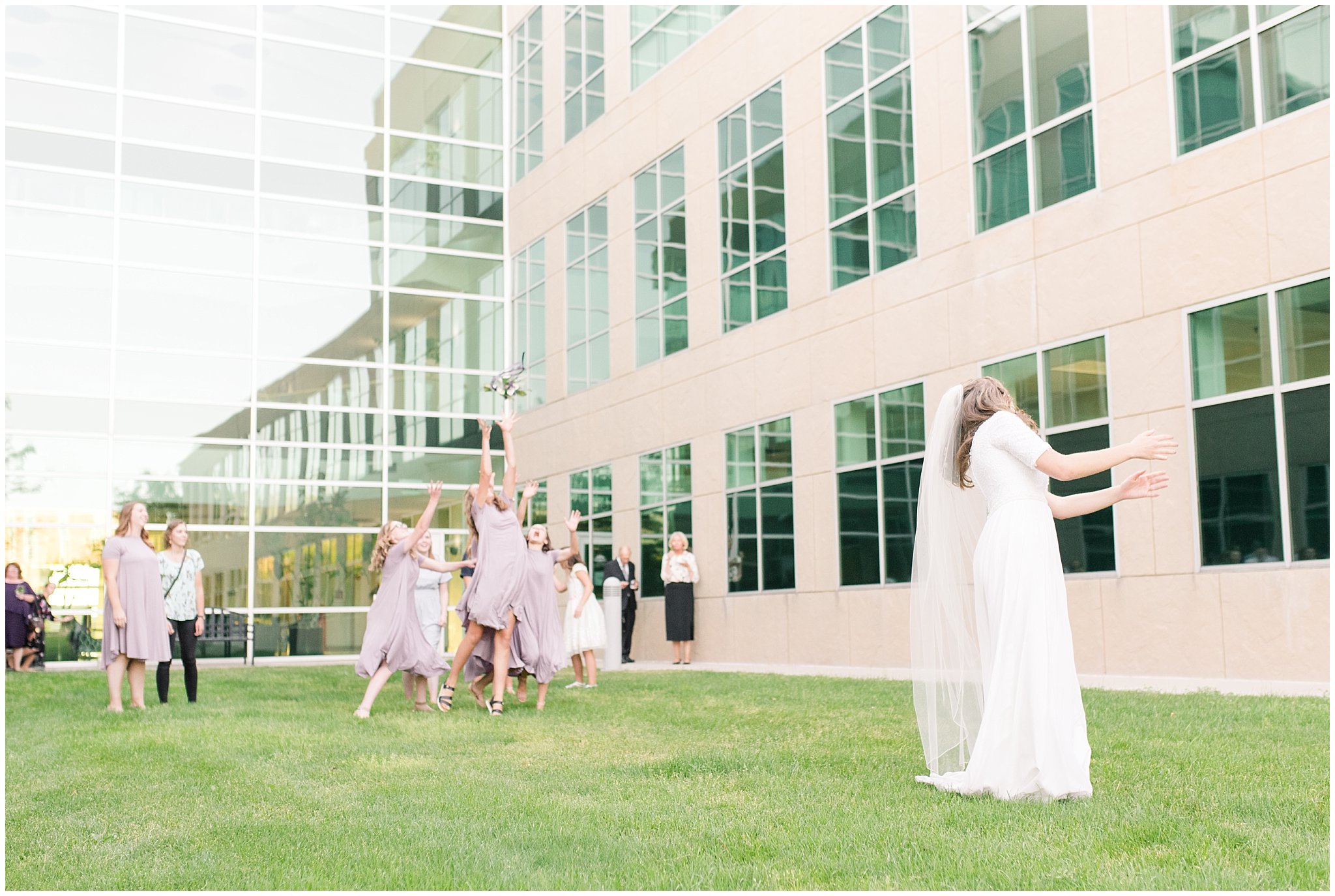 Bouquet toss with a lot of bridesmaids outdoors | Salt Lake Temple Wedding and Clearfield City Hall Reception | Utah Wedding Photographers | Jessie and Dallin Photography