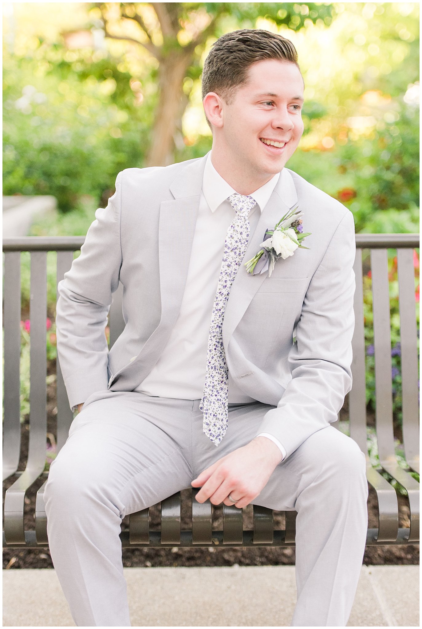 Groom wearing grey suit with lavender floral tie | Elegant formal session at the Salt Lake Temple and Ensign Peak Formal Session | Jessie and Dallin Photography