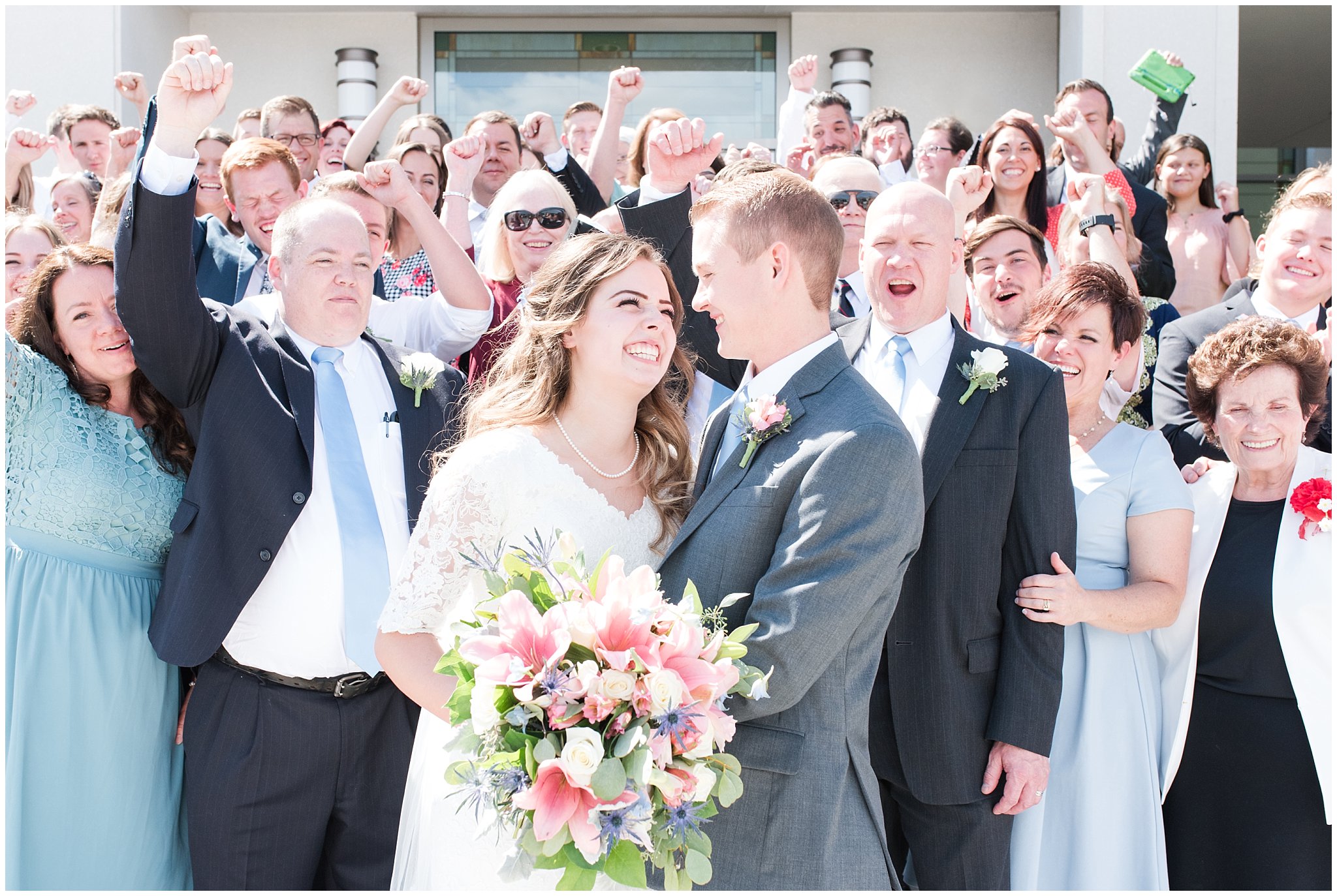 Bride with lace wedding dress and veil and groom wearing grey suit with light blue tie | Family portraits | Ogden Temple Summer Wedding | Jessie and Dallin Photography