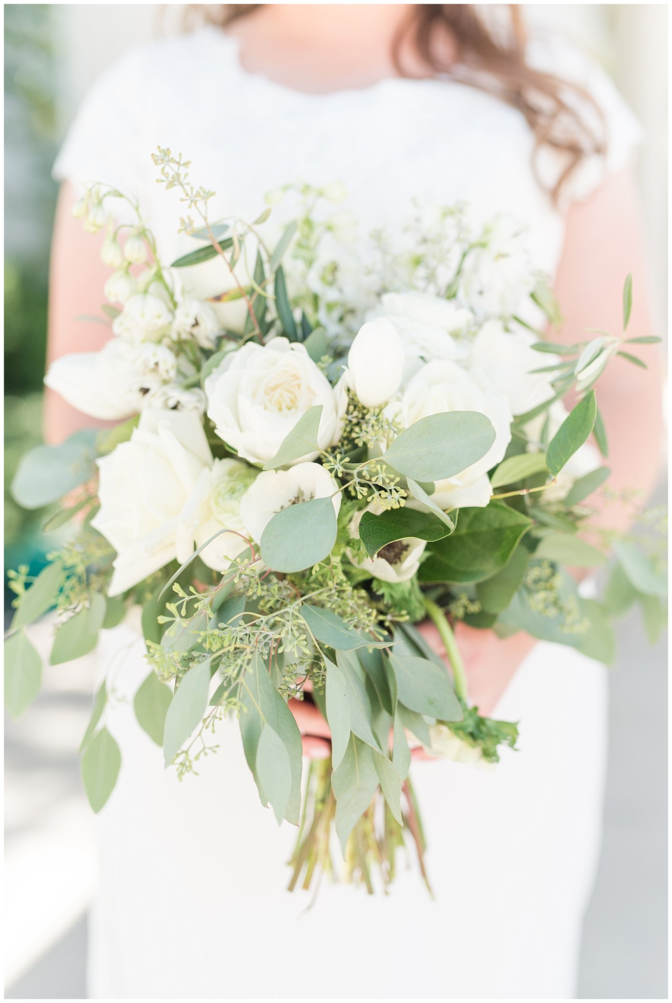 Bride in elegant lace dress, white anemones bouquet, and vintage veil | Summer Bountiful Temple Wedding | Jessie and Dallin Photography