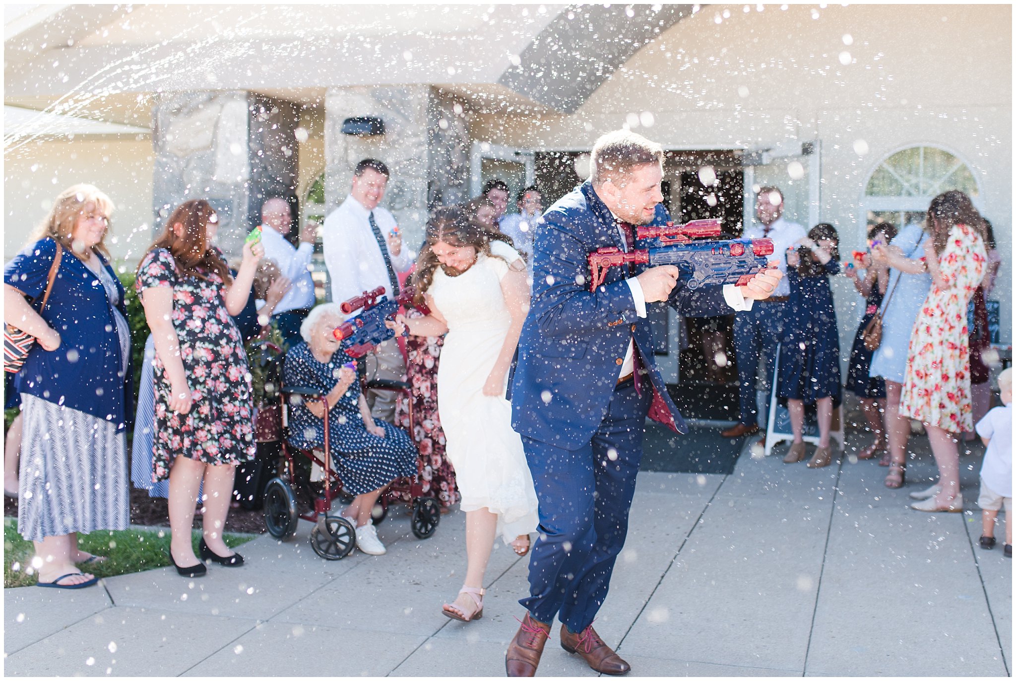 Squirt gun, water gun wedding exit sendoff | Navy and wine wedding | Summer Bountiful Temple Wedding | Jessie and Dallin Photography