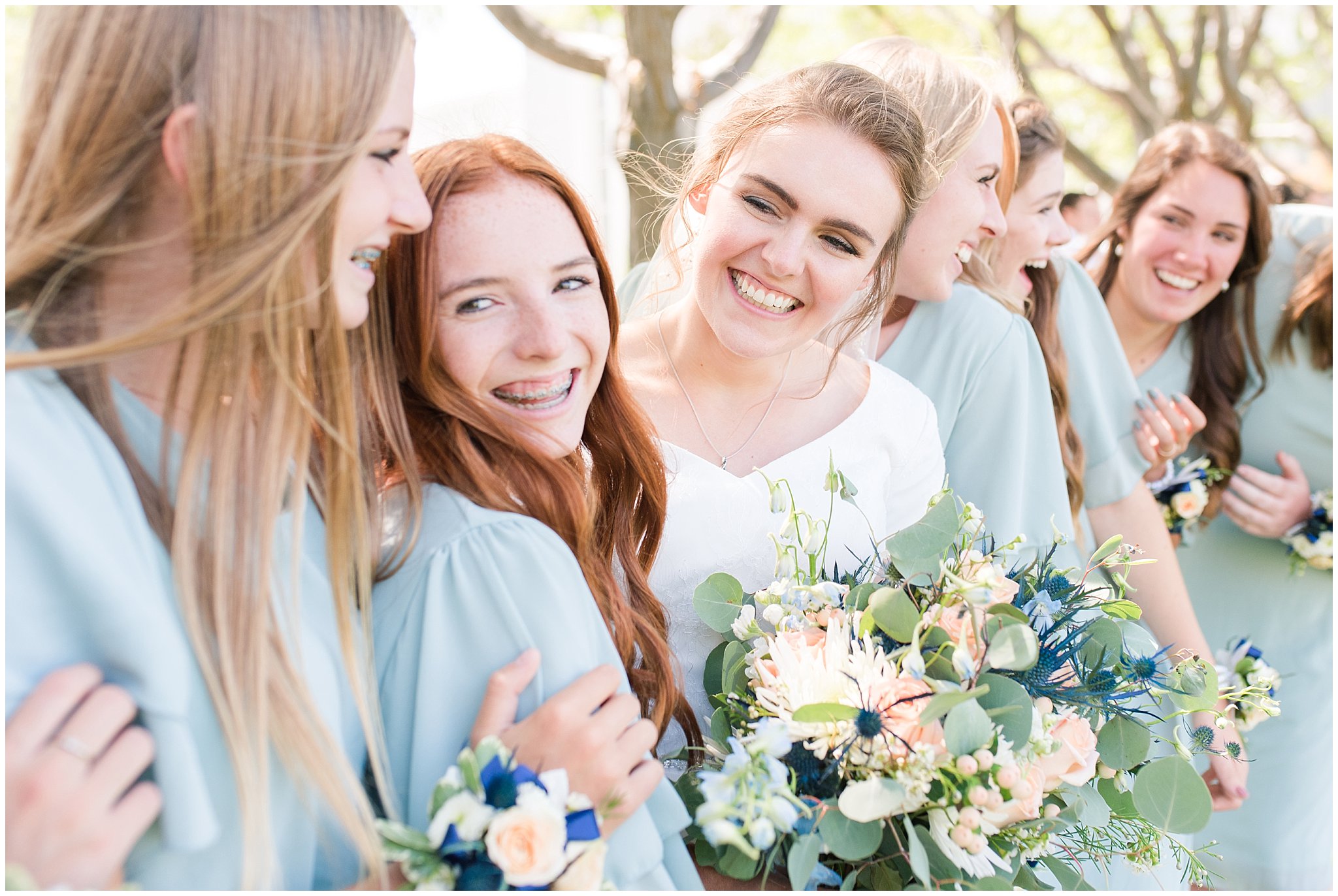 Bride with bridesmaids wearing sage dresses with corsages on wrists | Bountiful Temple Wedding and Oak Hills Reception | Jessie and Dallin Photography