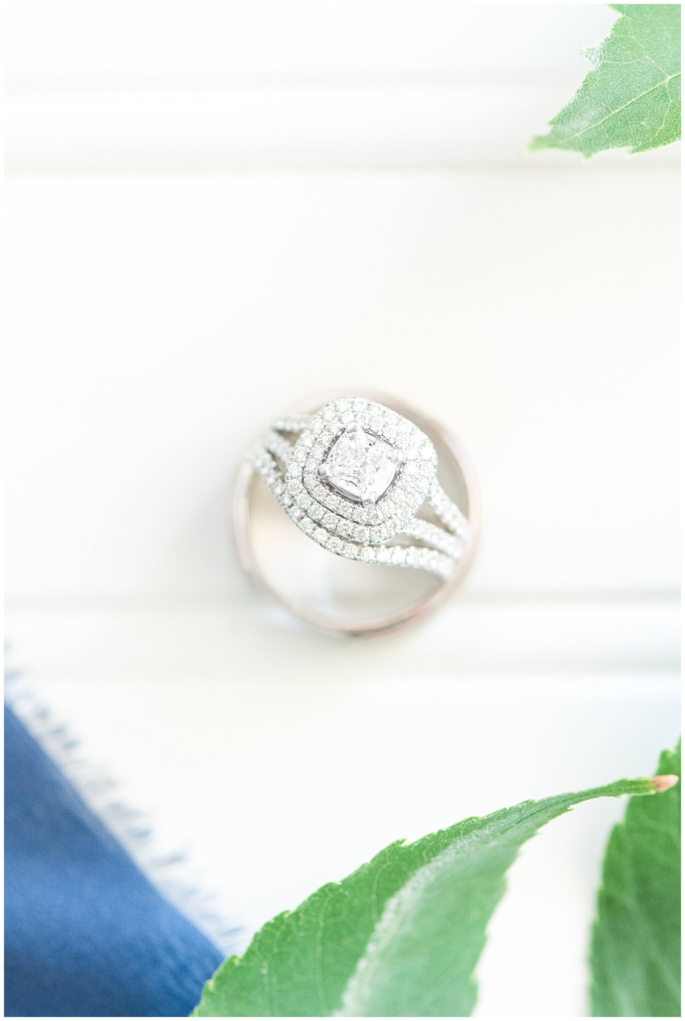 Wedding ring on blue ribbon | Log Haven Summer Mountain Wedding | Jessie and Dallin Photography