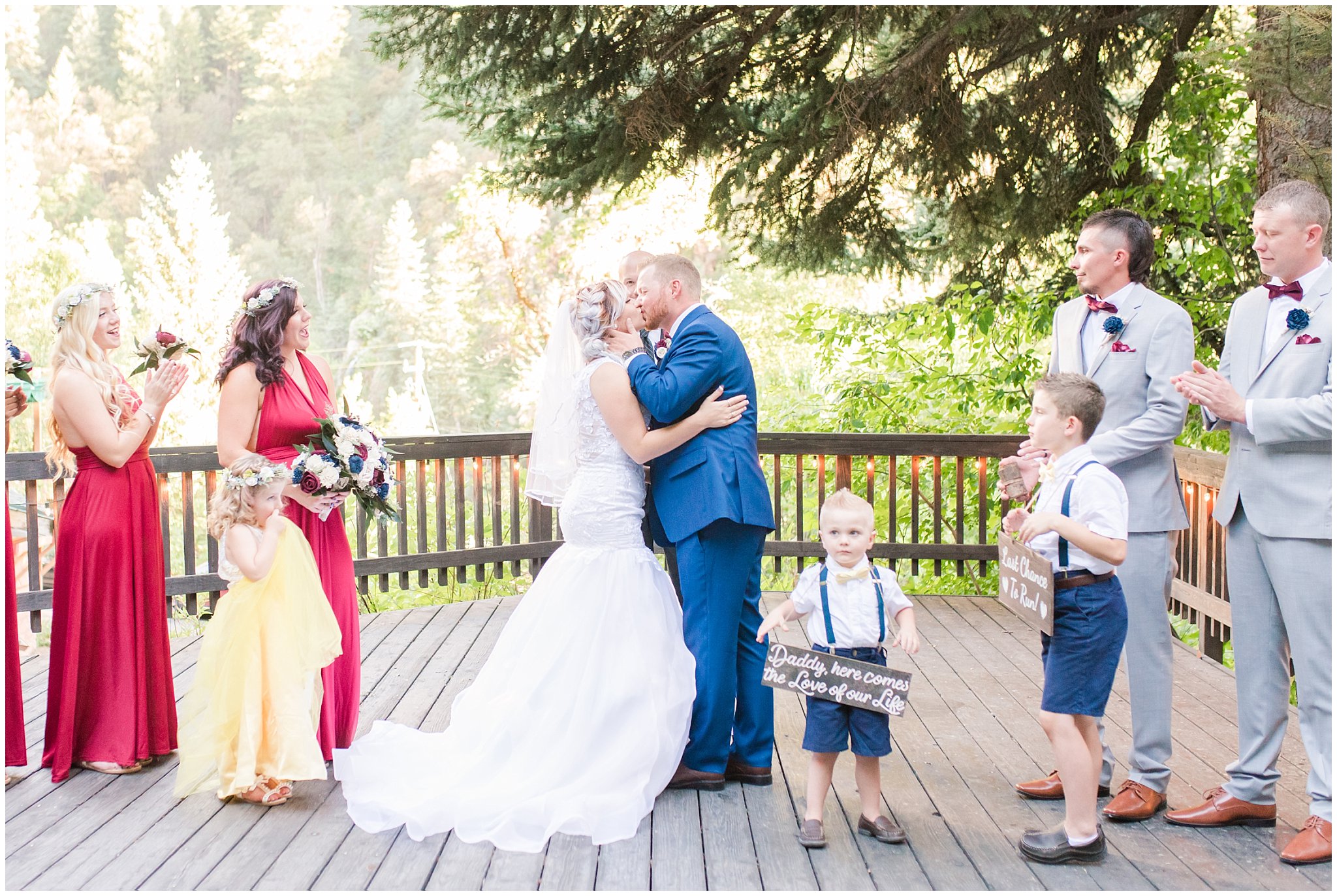 Bride and groom kiss at the alter | Log Haven Summer Mountain Wedding | Jessie and Dallin Photography