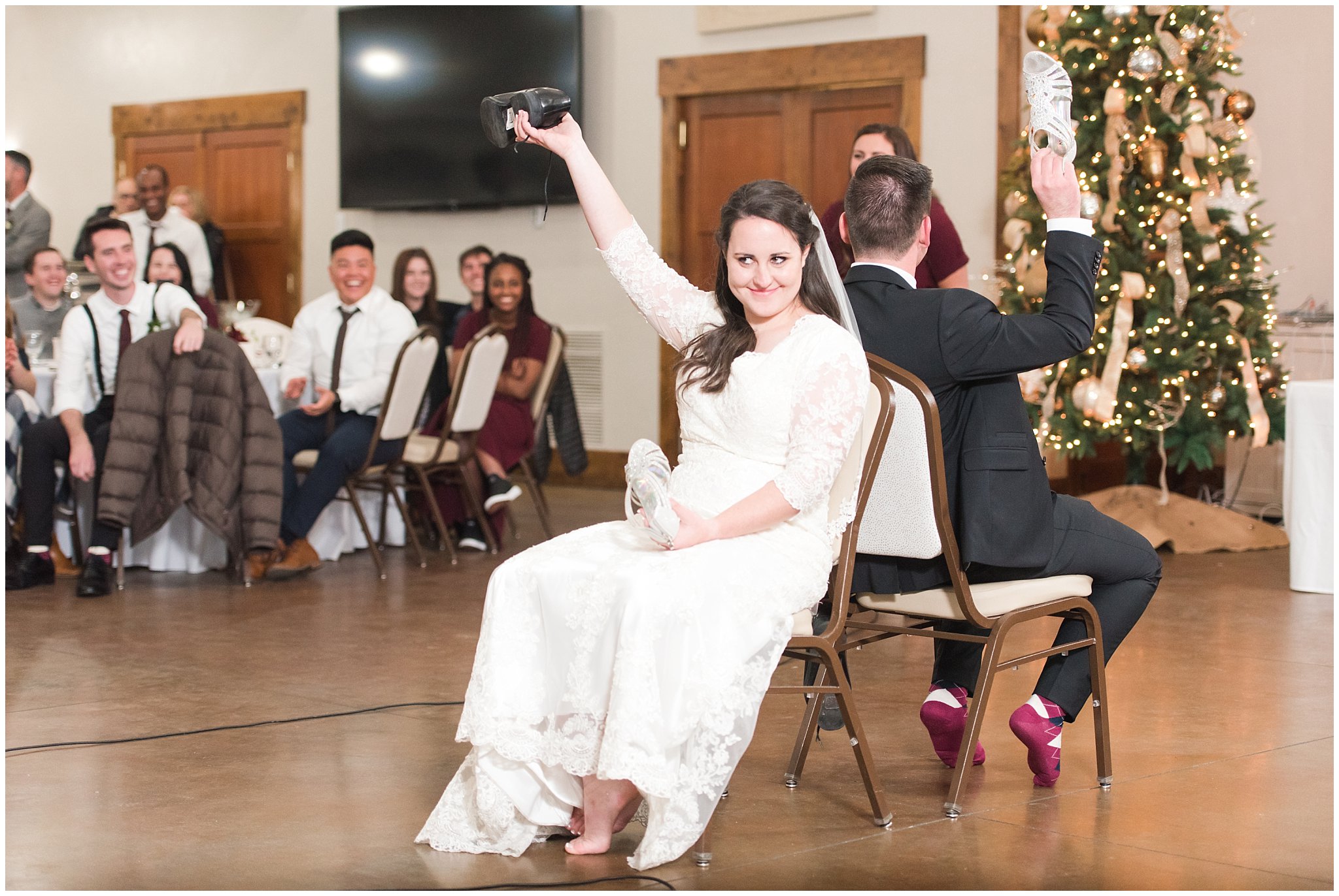 Bride and groom play the shoe game at the Gathering Place at Gardner Village | Gardner Village Wedding | The Gathering Place | Jessie and Dallin Photography