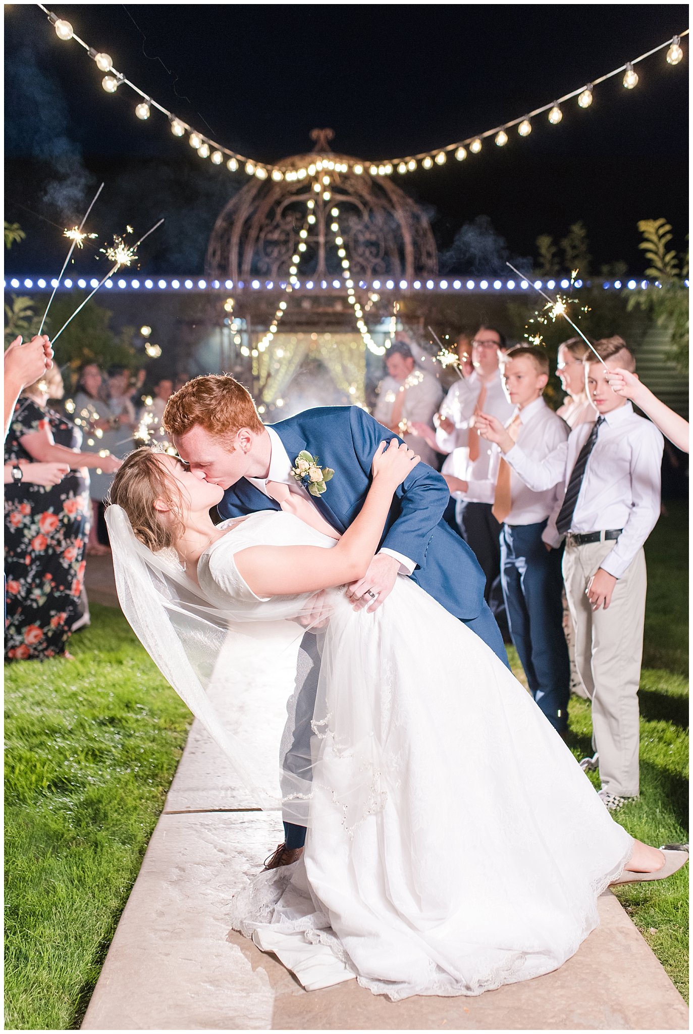 Bride and groom dip and kiss during romantic sparkler exit sendoff | Top Utah Wedding and Couples Photos 2019 | Jessie and Dallin Photography